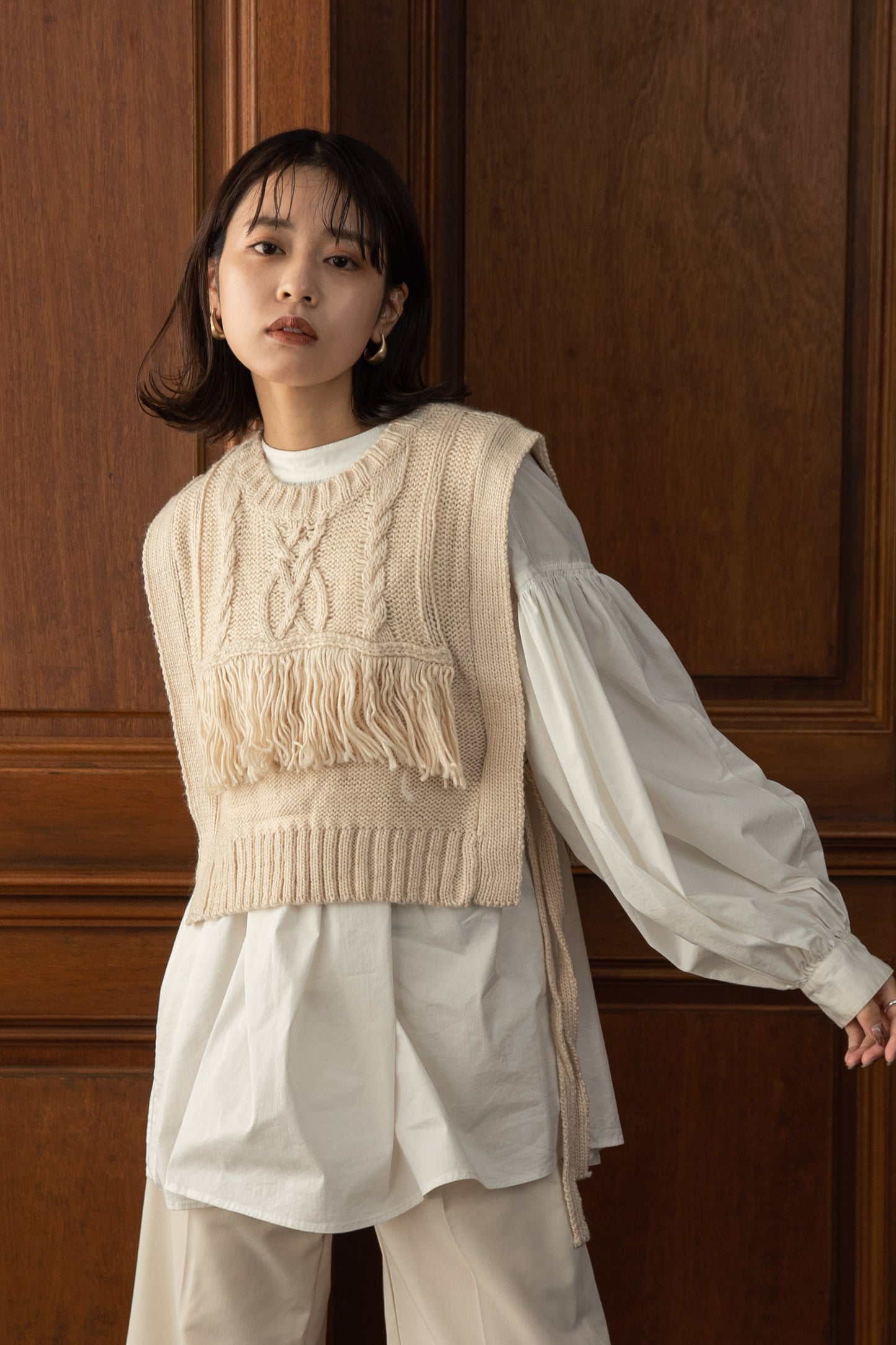 cable knit fringe vest
