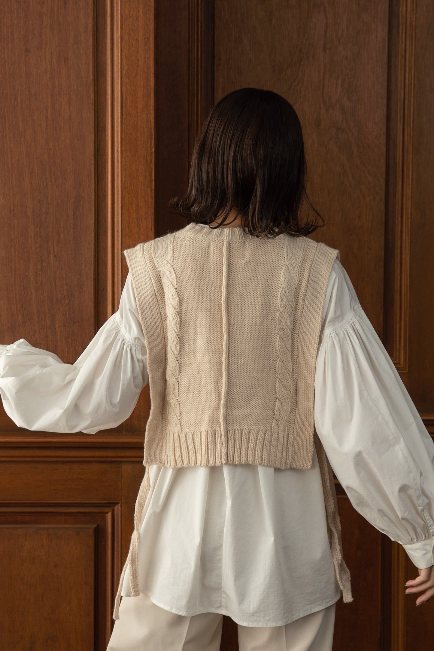 cable knit fringe vest