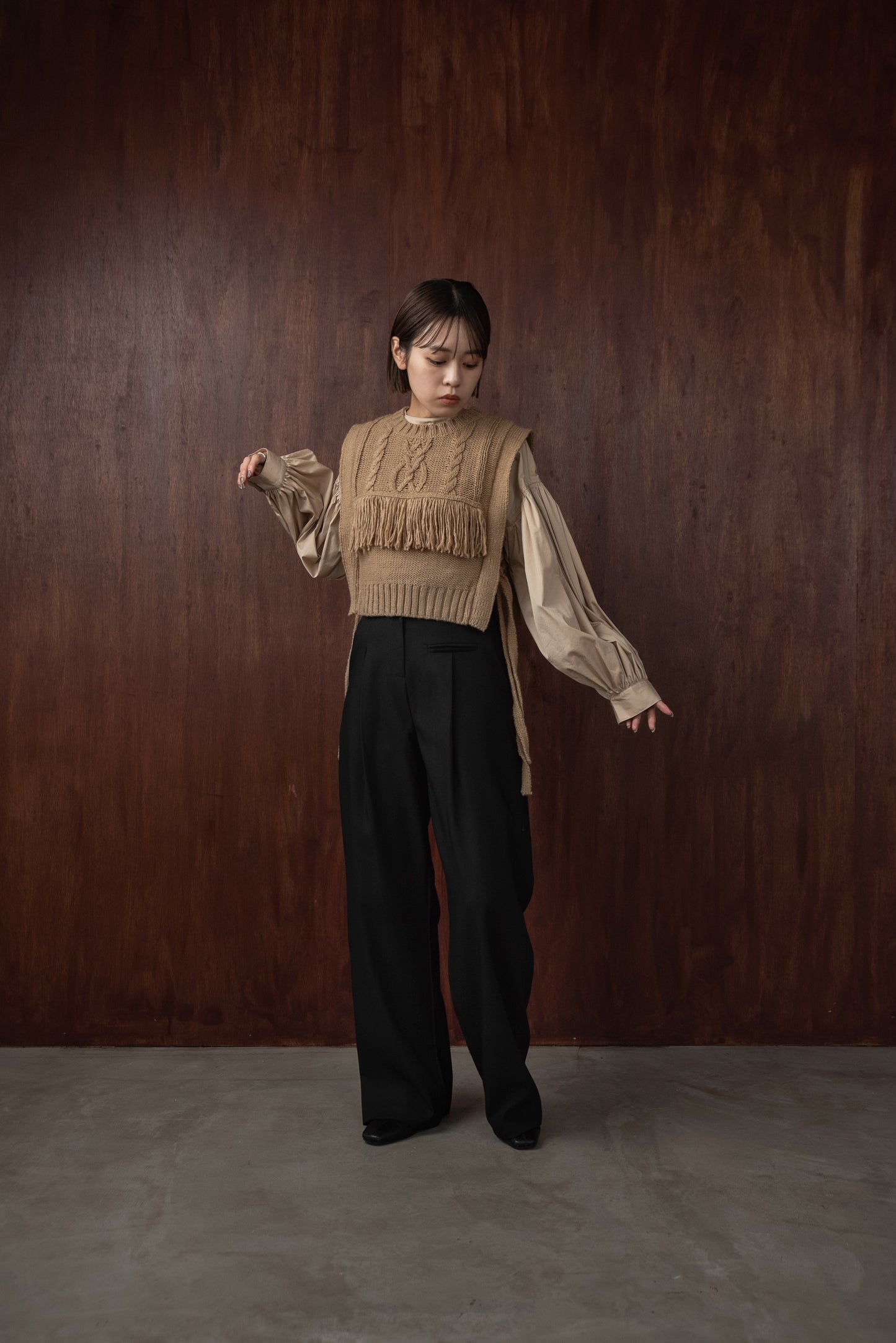 cable knit fringe vest