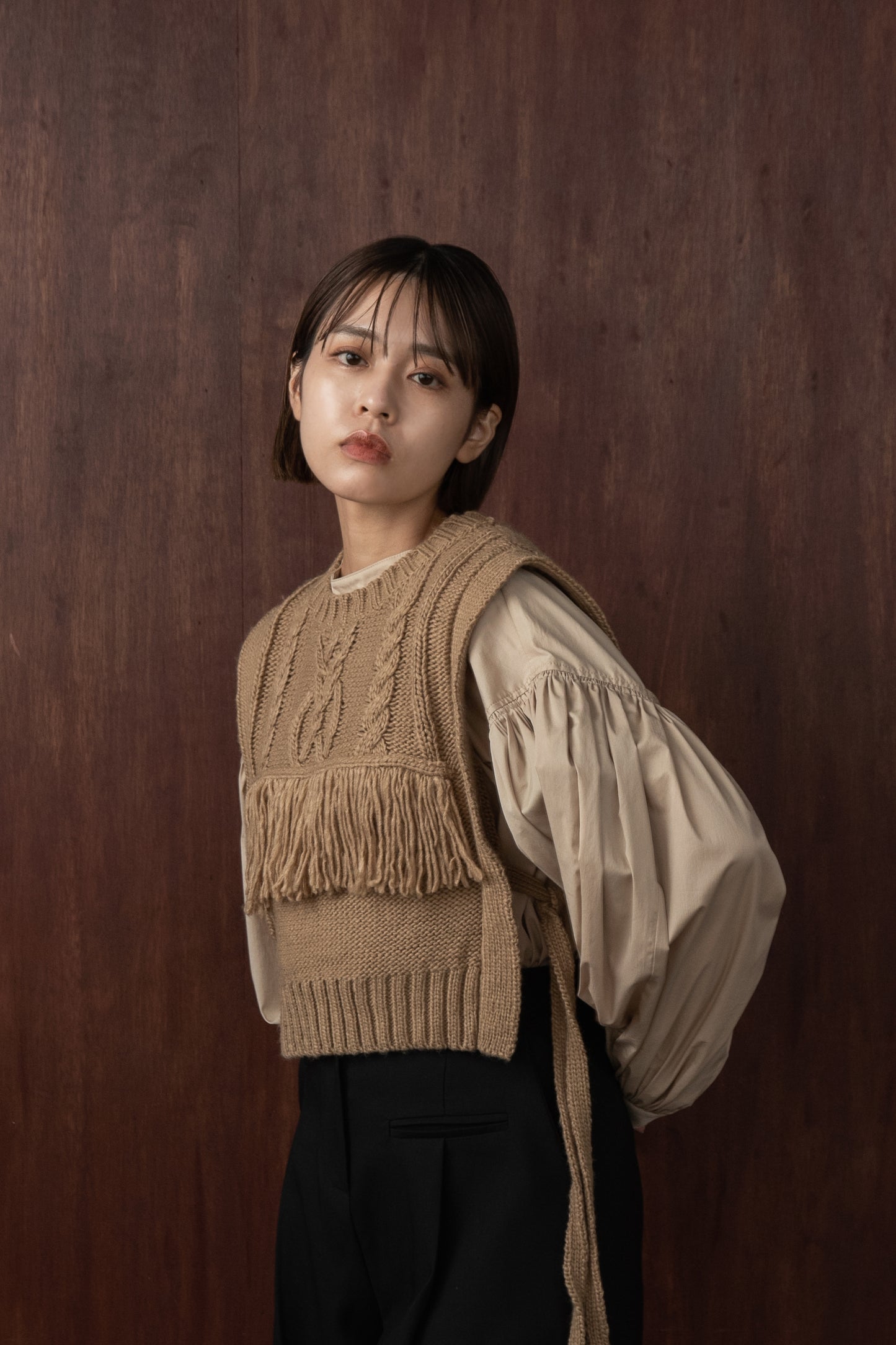 cable knit fringe vest