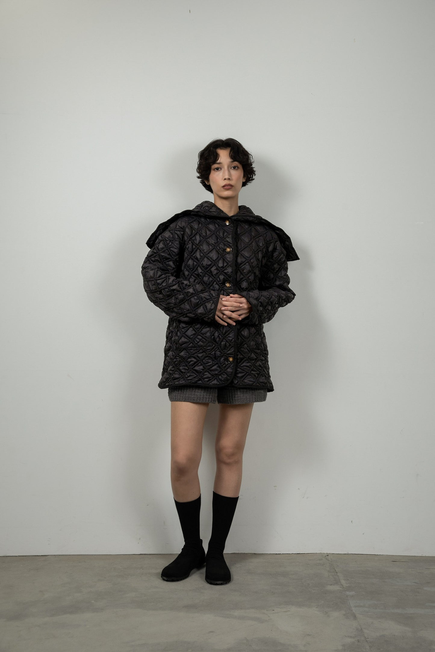 hooded quilted stitch point coat
