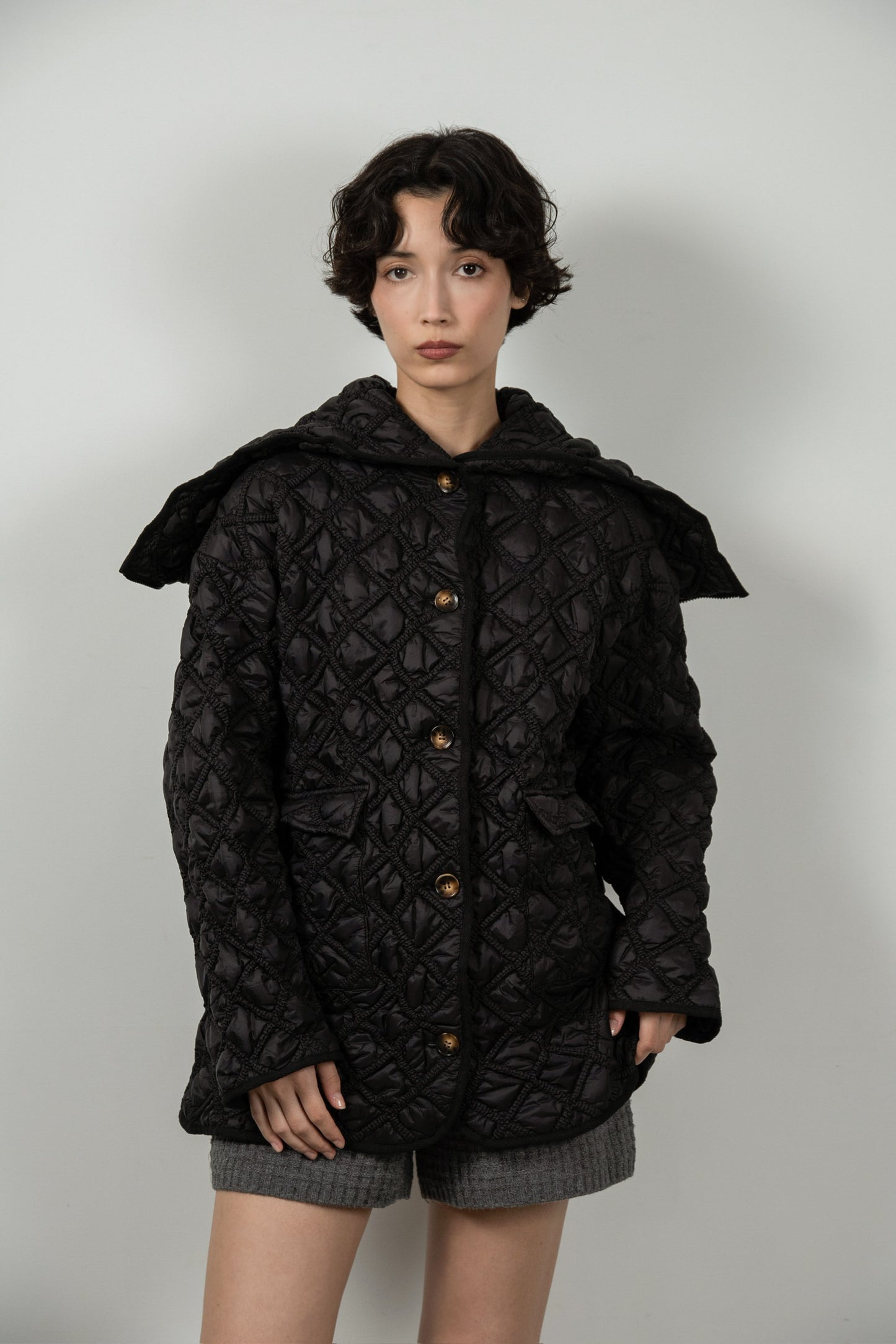hooded quilted stitch point coat