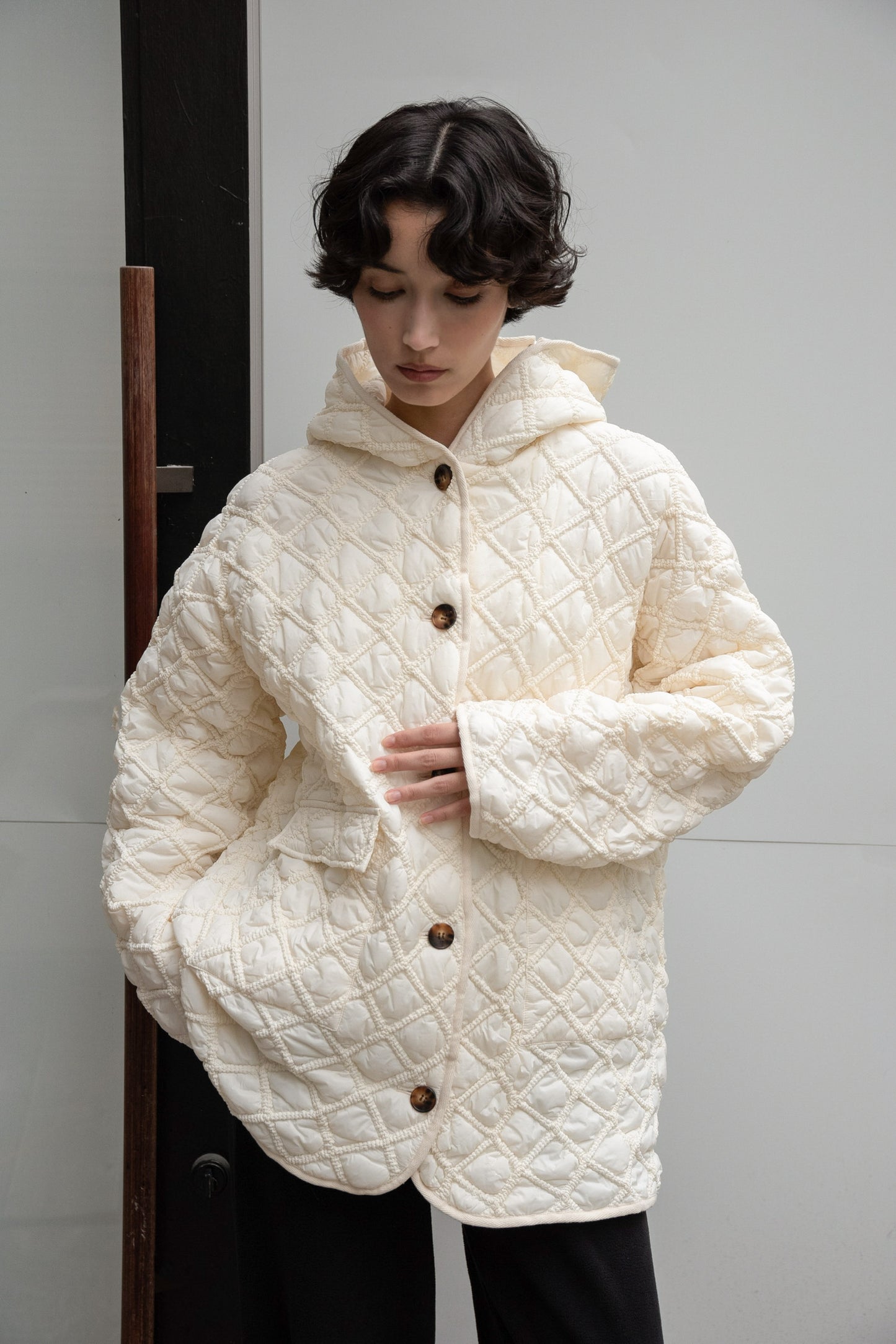 hooded quilted stitch point coat