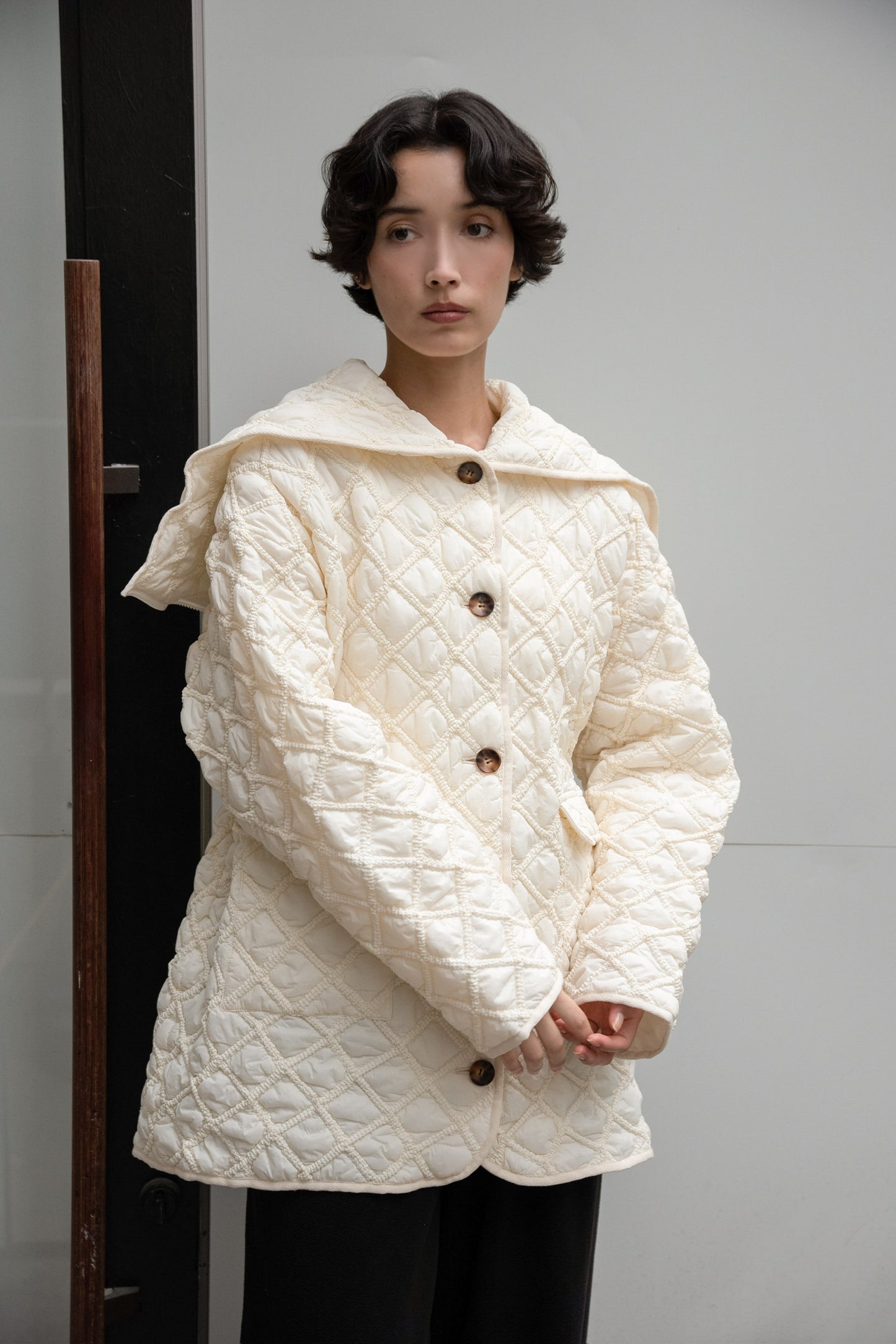 hooded quilted stitch point coat