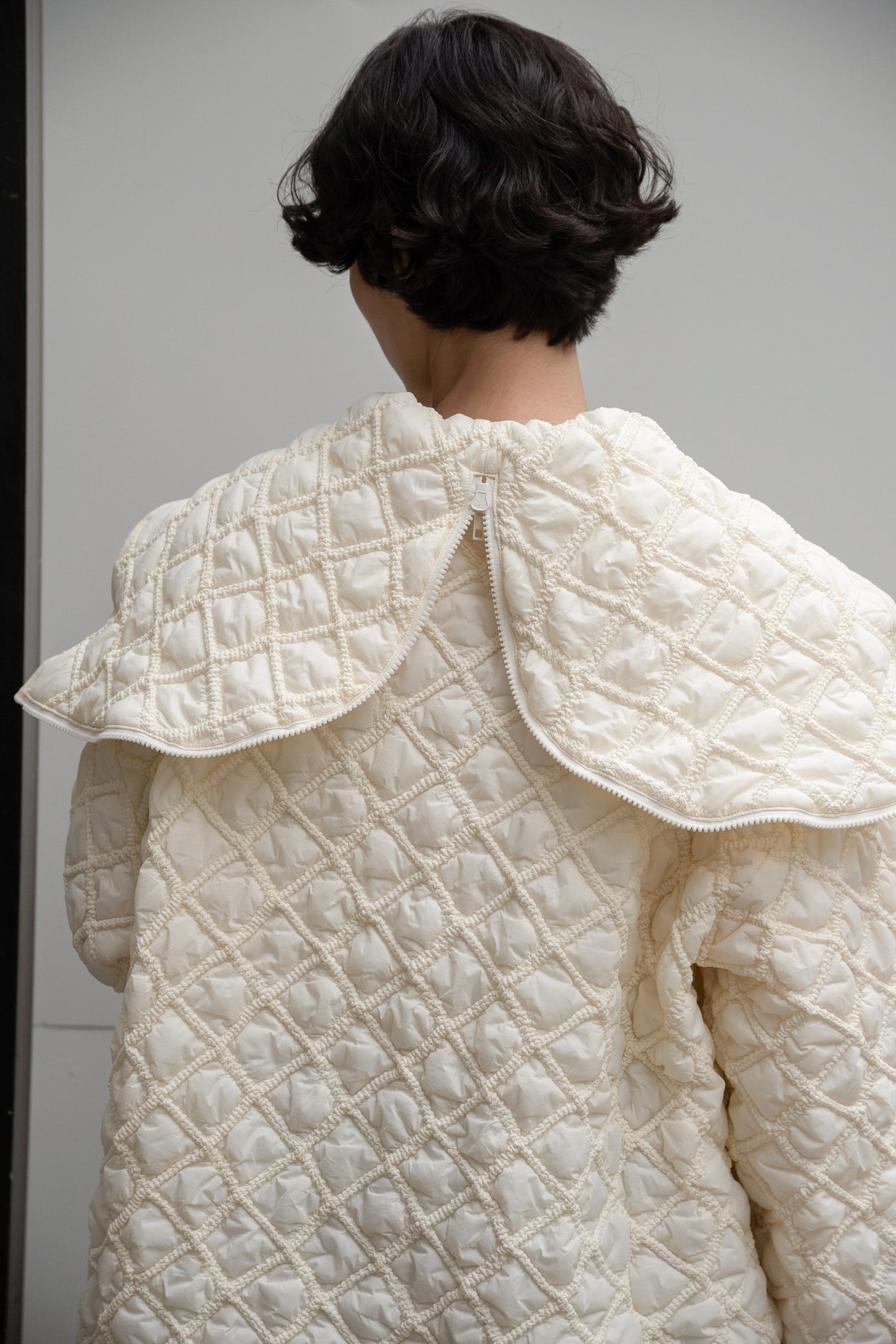 hooded quilted stitch point coat