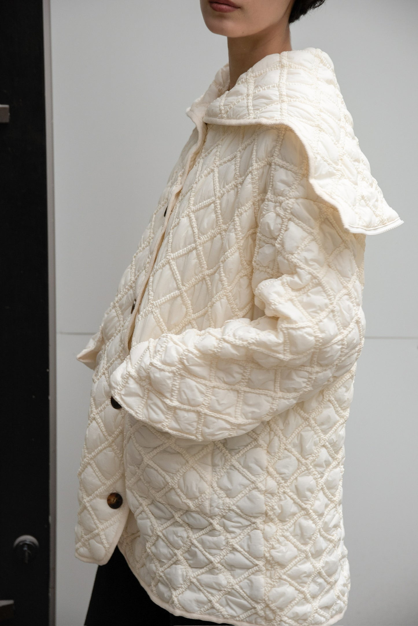 hooded quilted stitch point coat