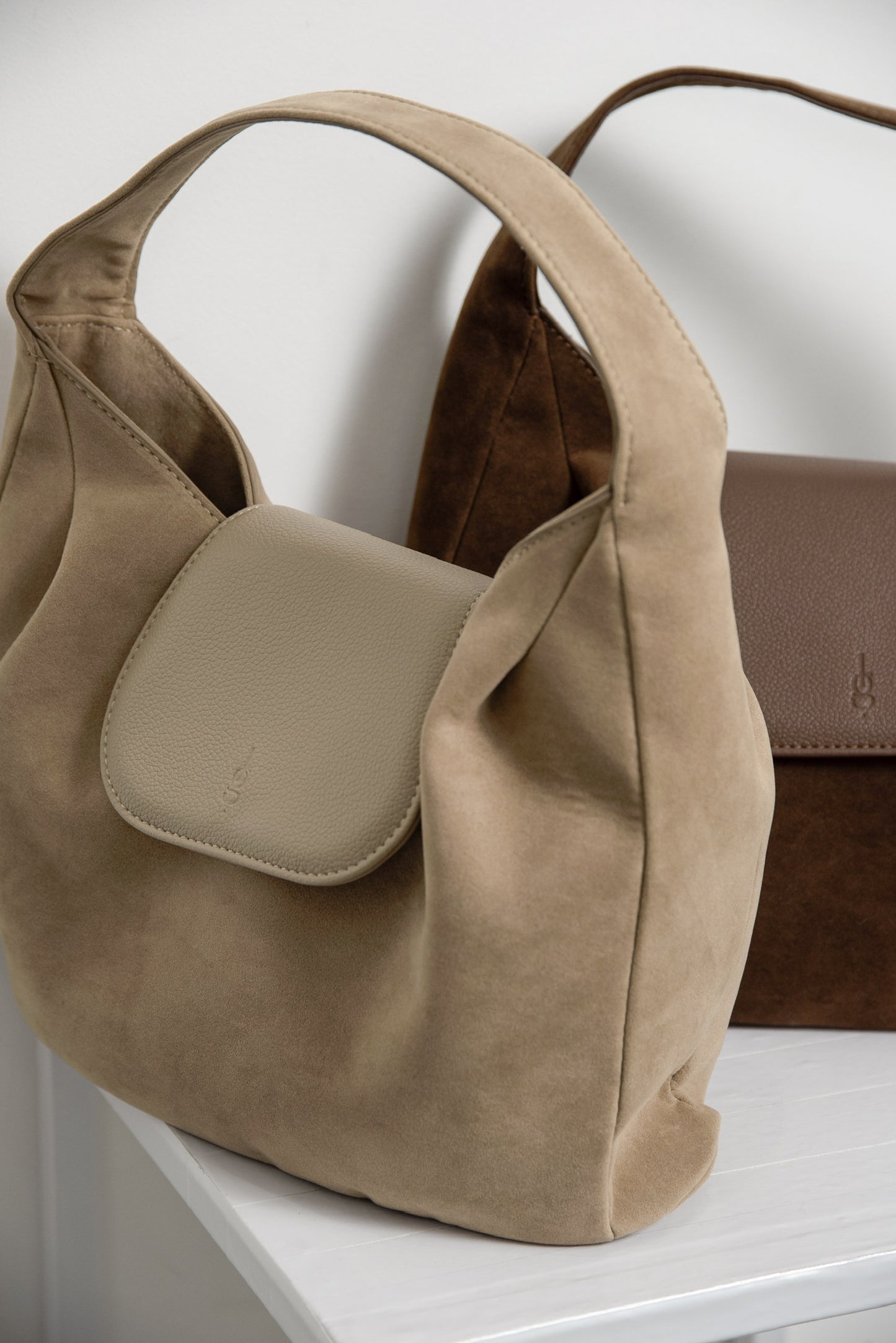 brushed material flap point bag