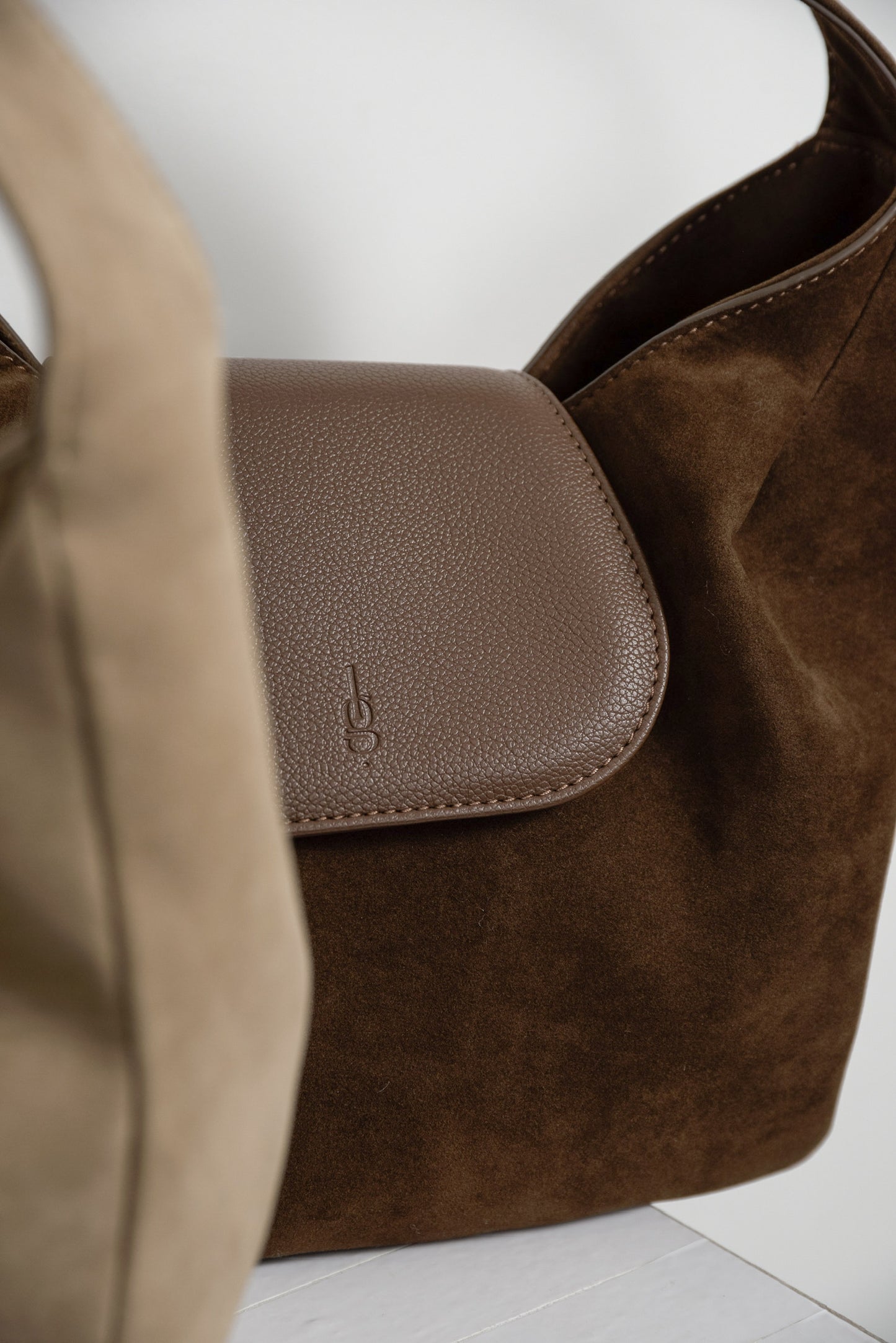 brushed material flap point bag