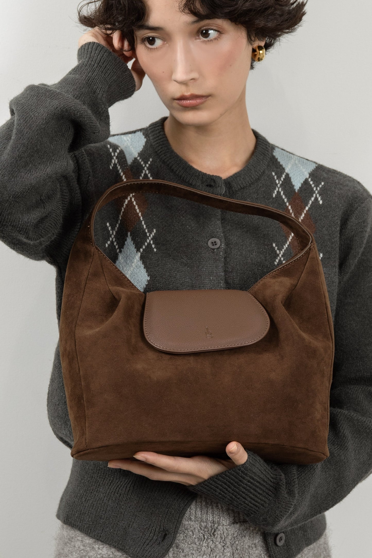 brushed material flap point bag