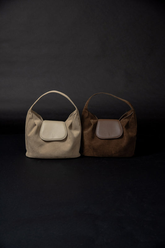 brushed material flap point bag