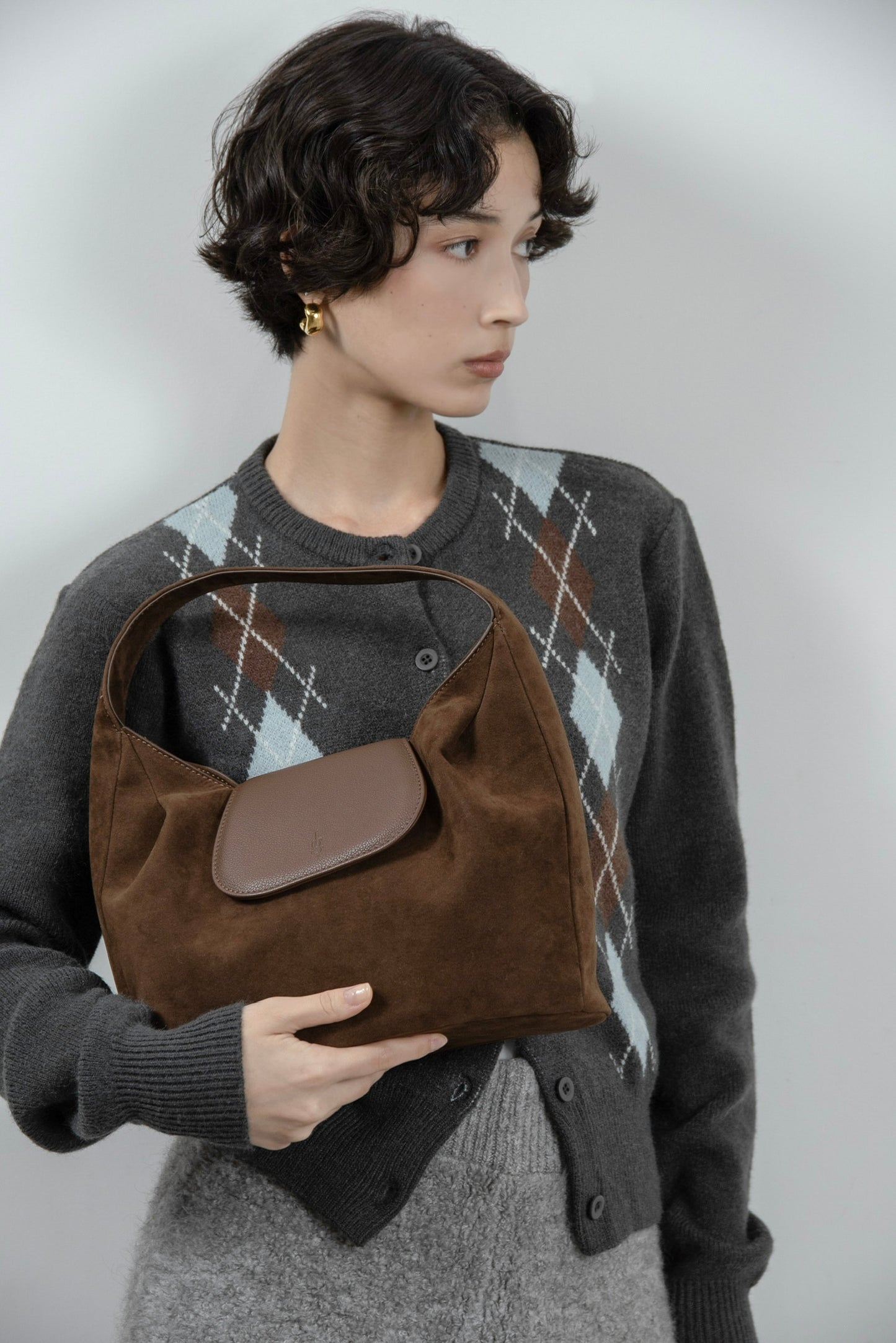 brushed material flap point bag