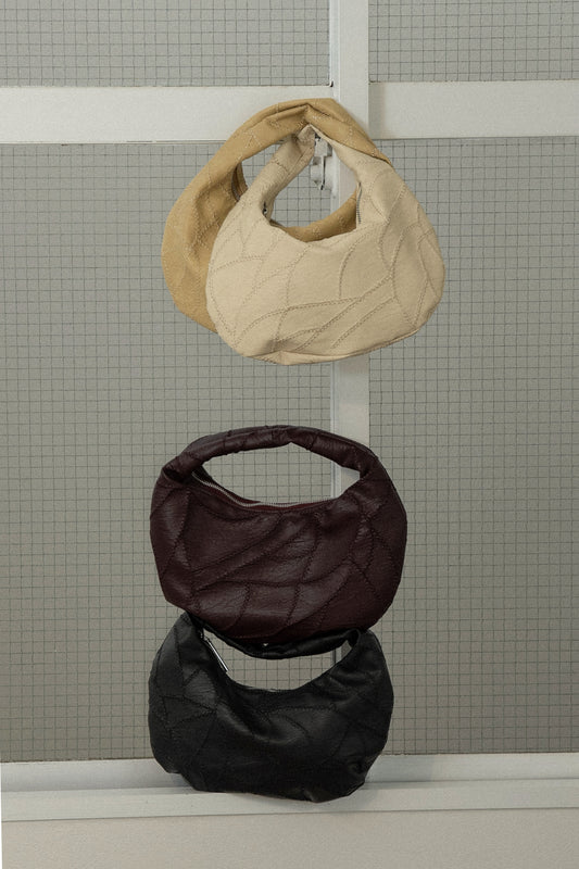 zigzag stitch patchwork oval bag