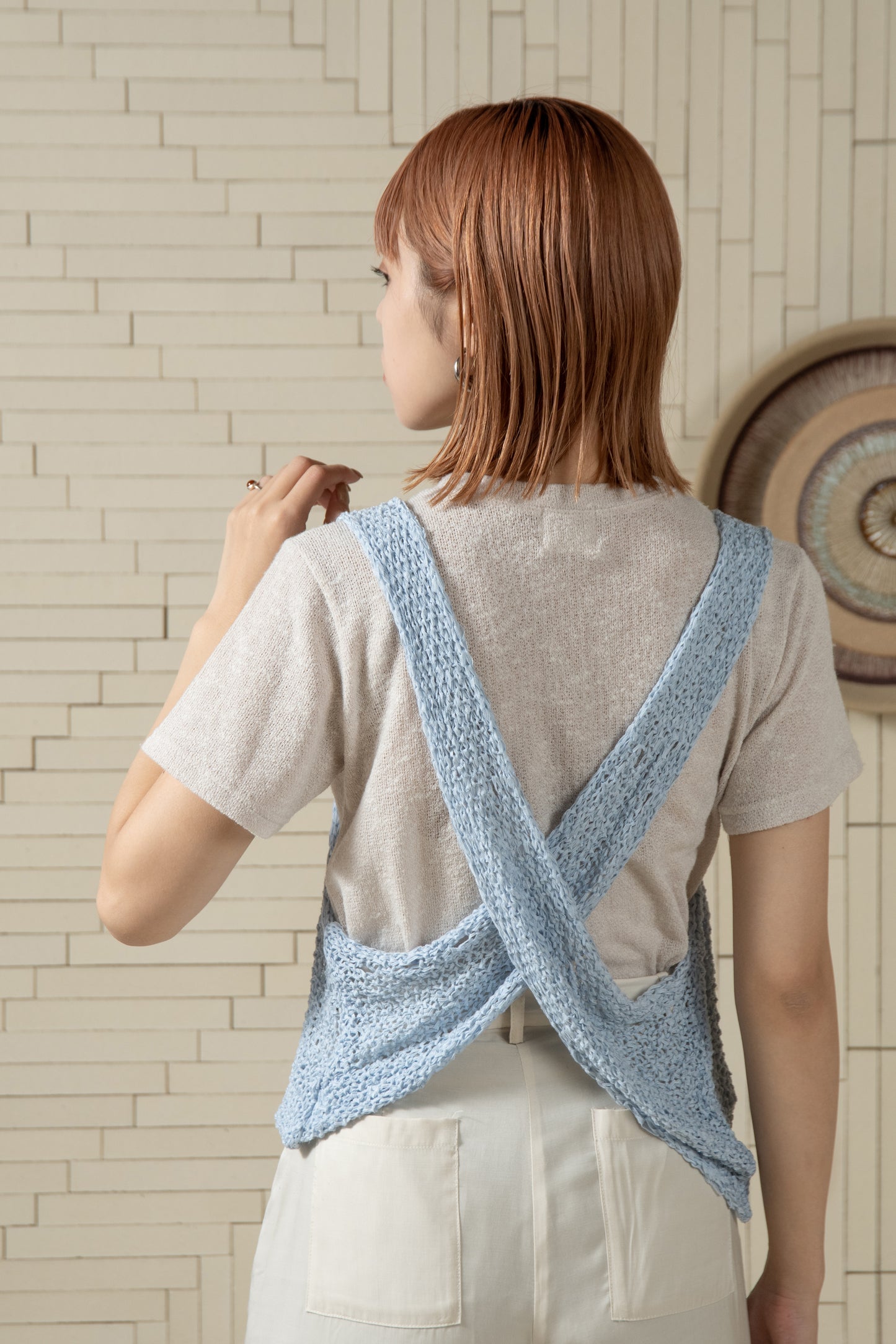 cross sheer knit tops