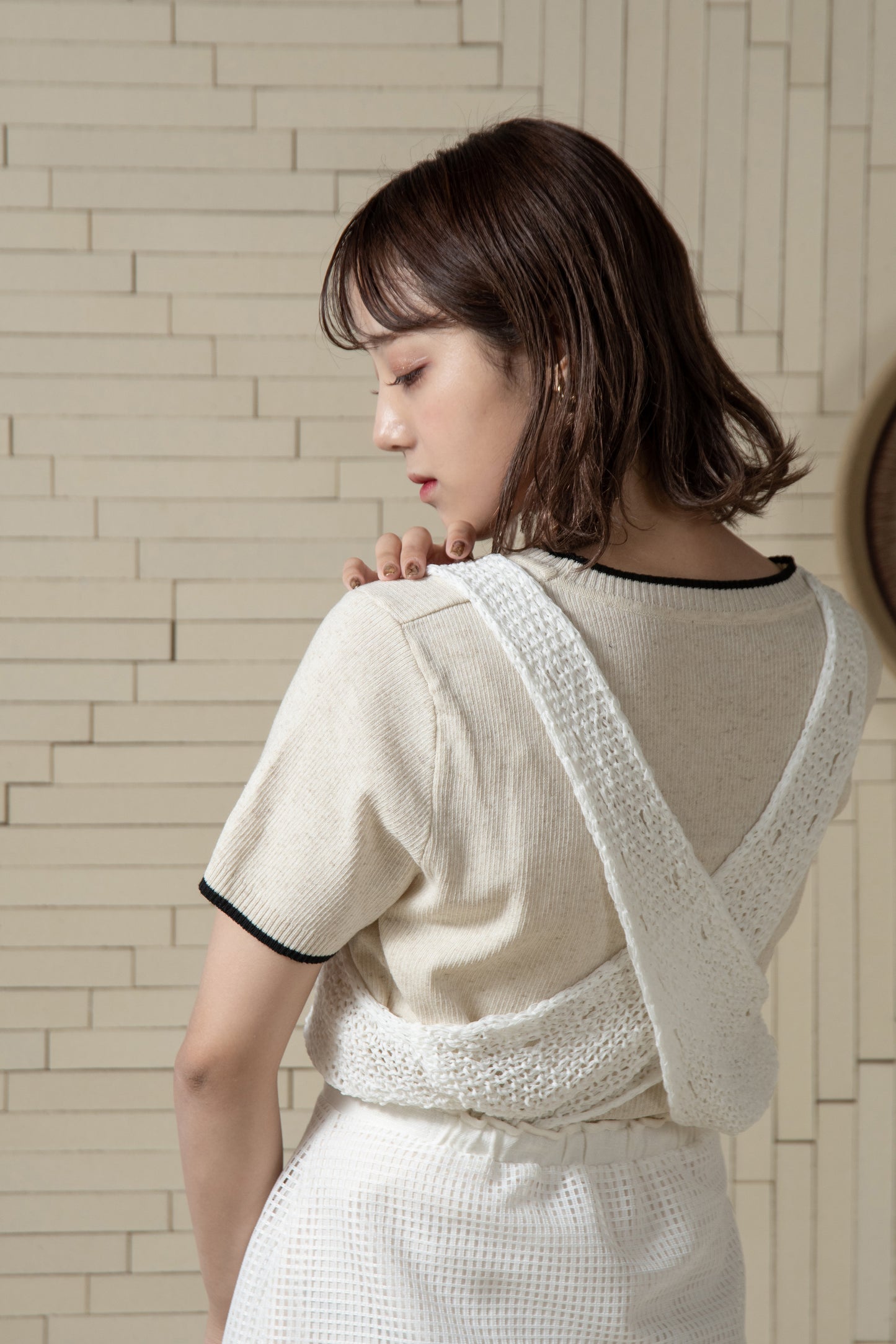 cross sheer knit tops
