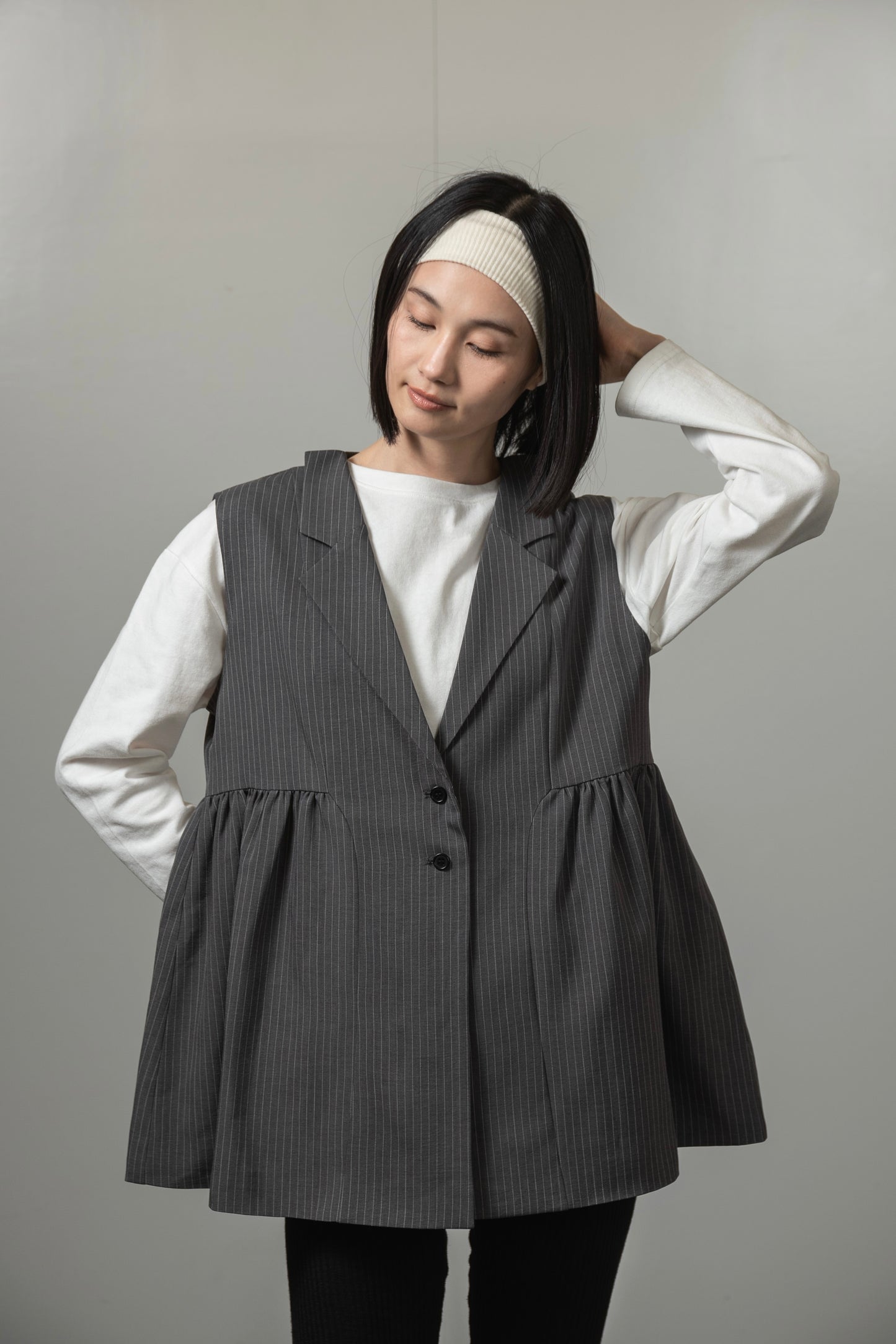 peplum button accent vest