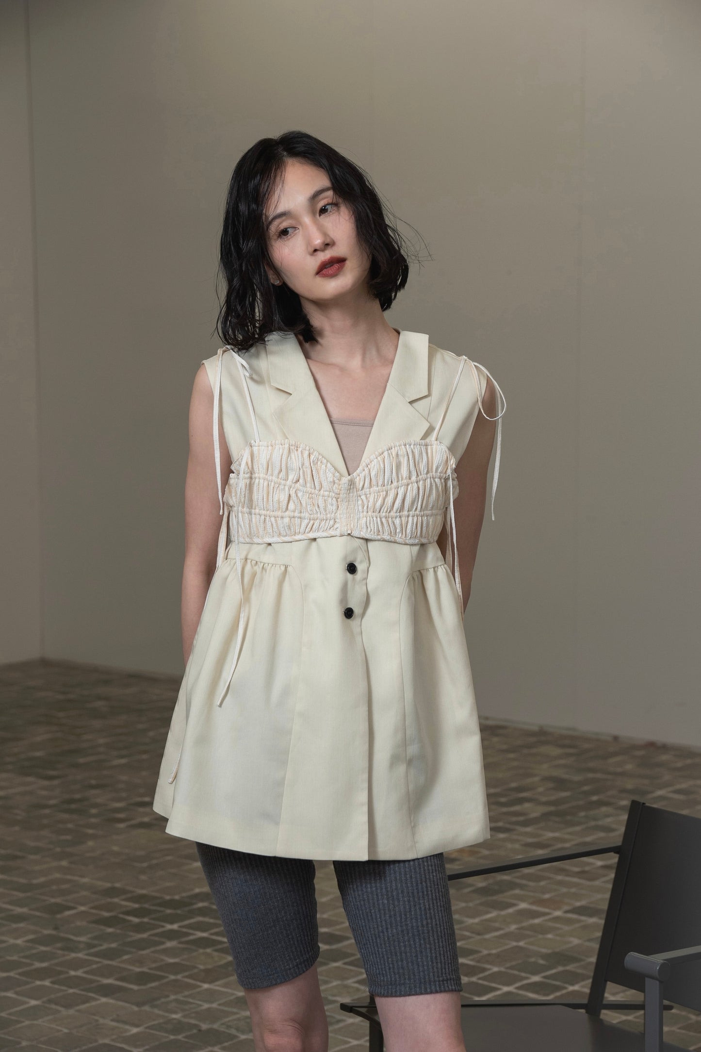 peplum button accent vest