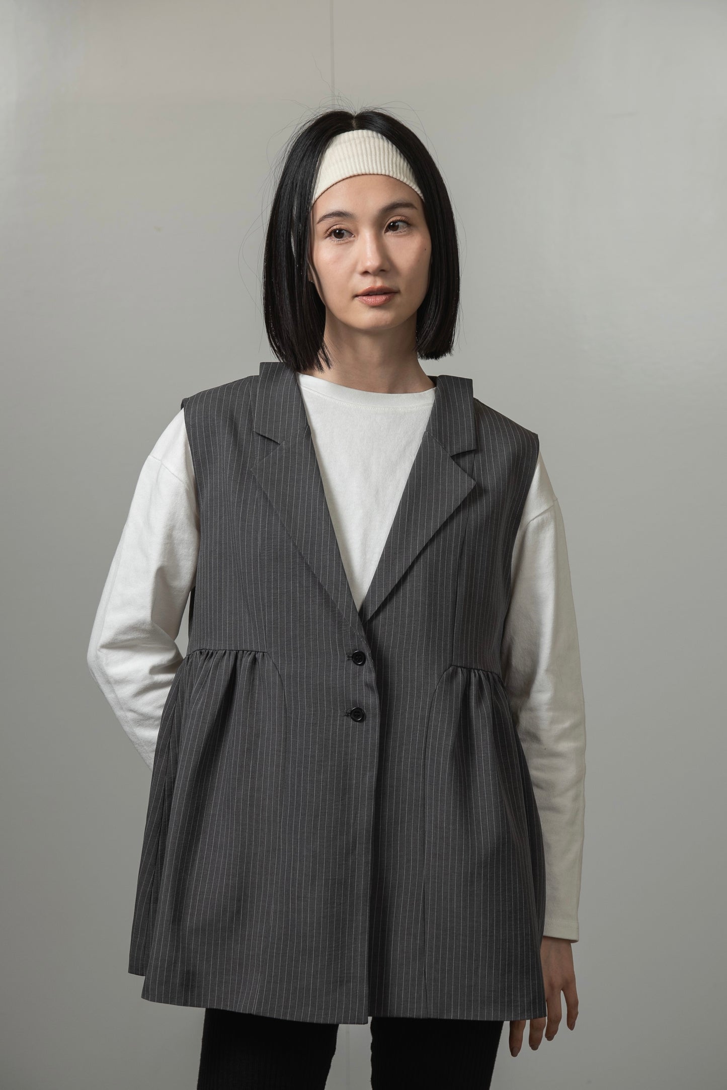 peplum button accent vest
