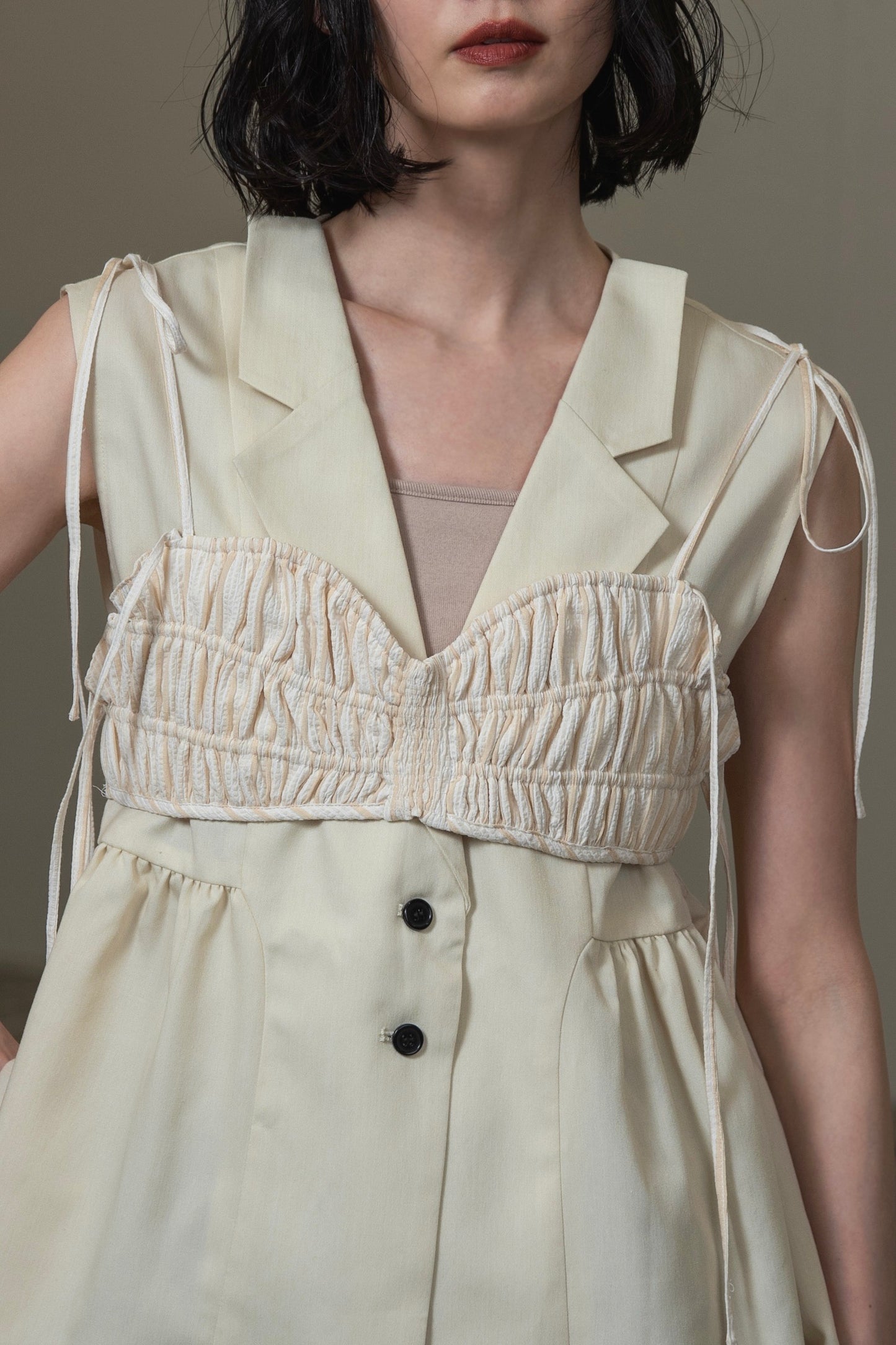 peplum button accent vest