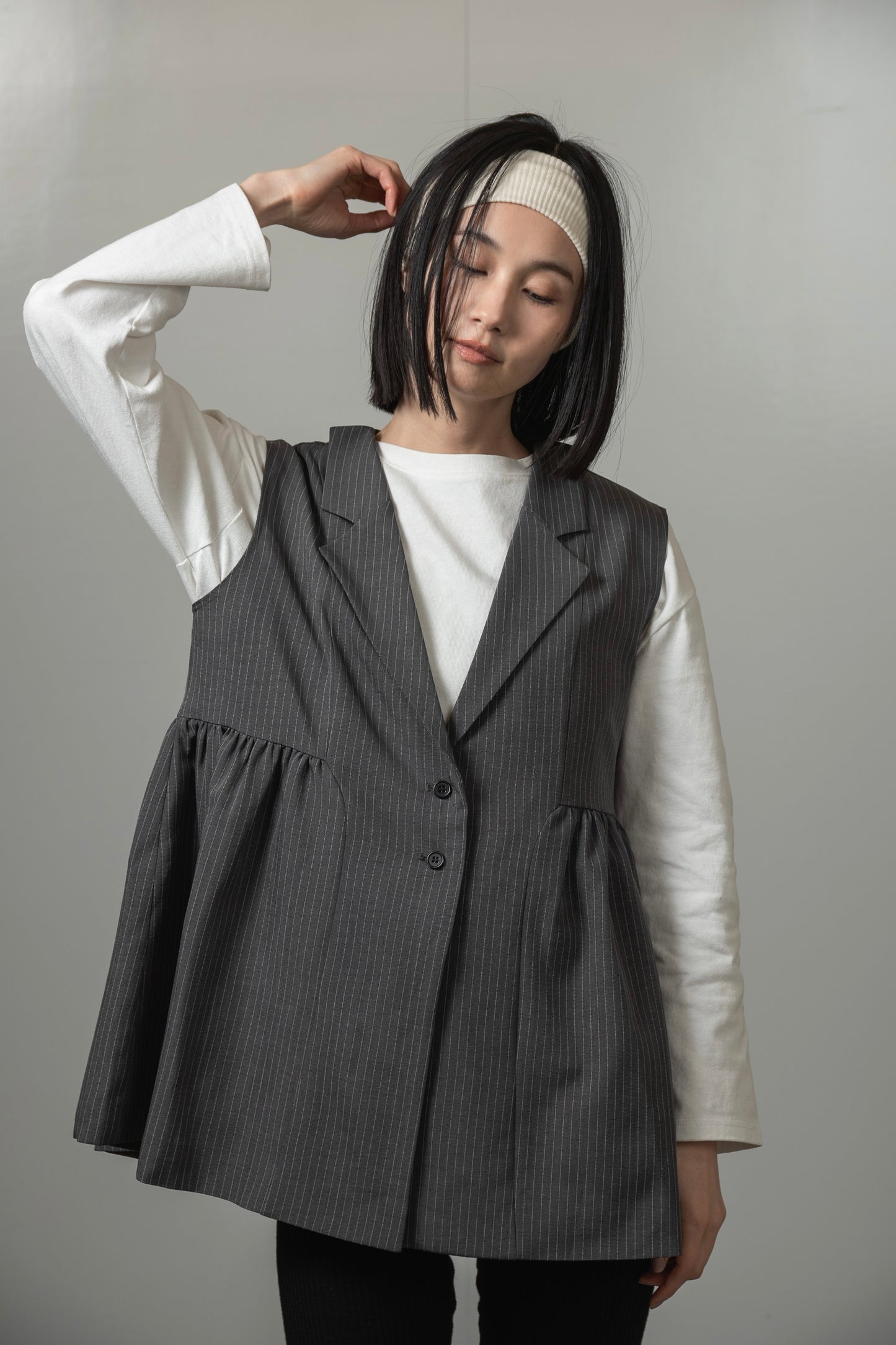 peplum button accent vest