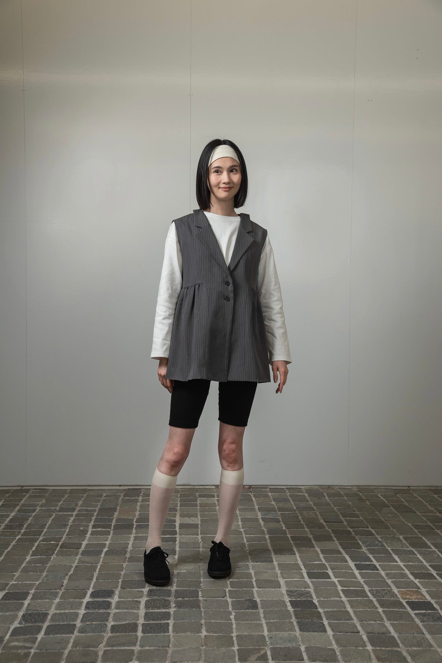 peplum button accent vest