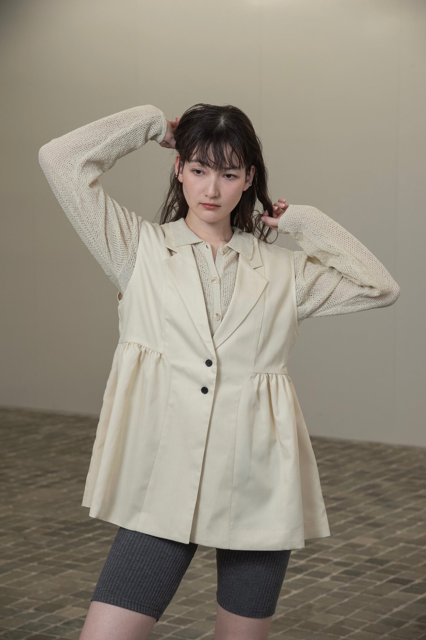 peplum button accent vest