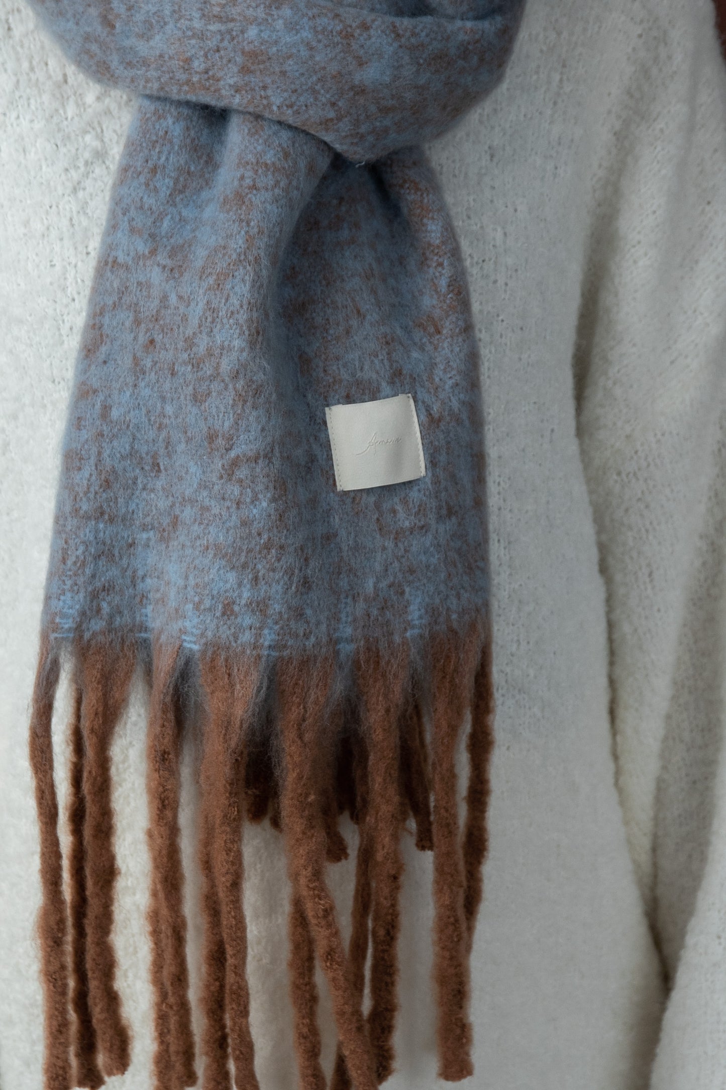 bulky volume fringe muffler