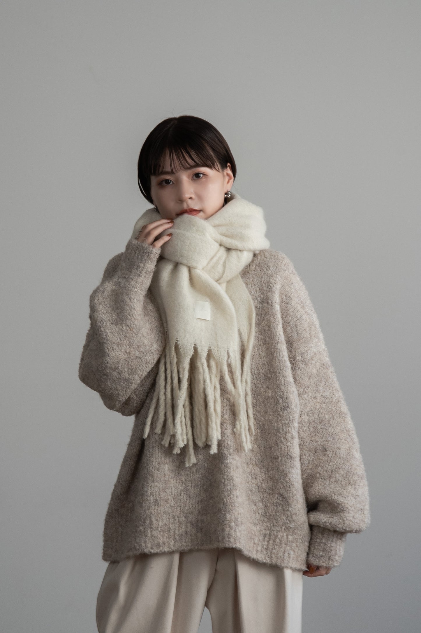 bulky volume fringe muffler