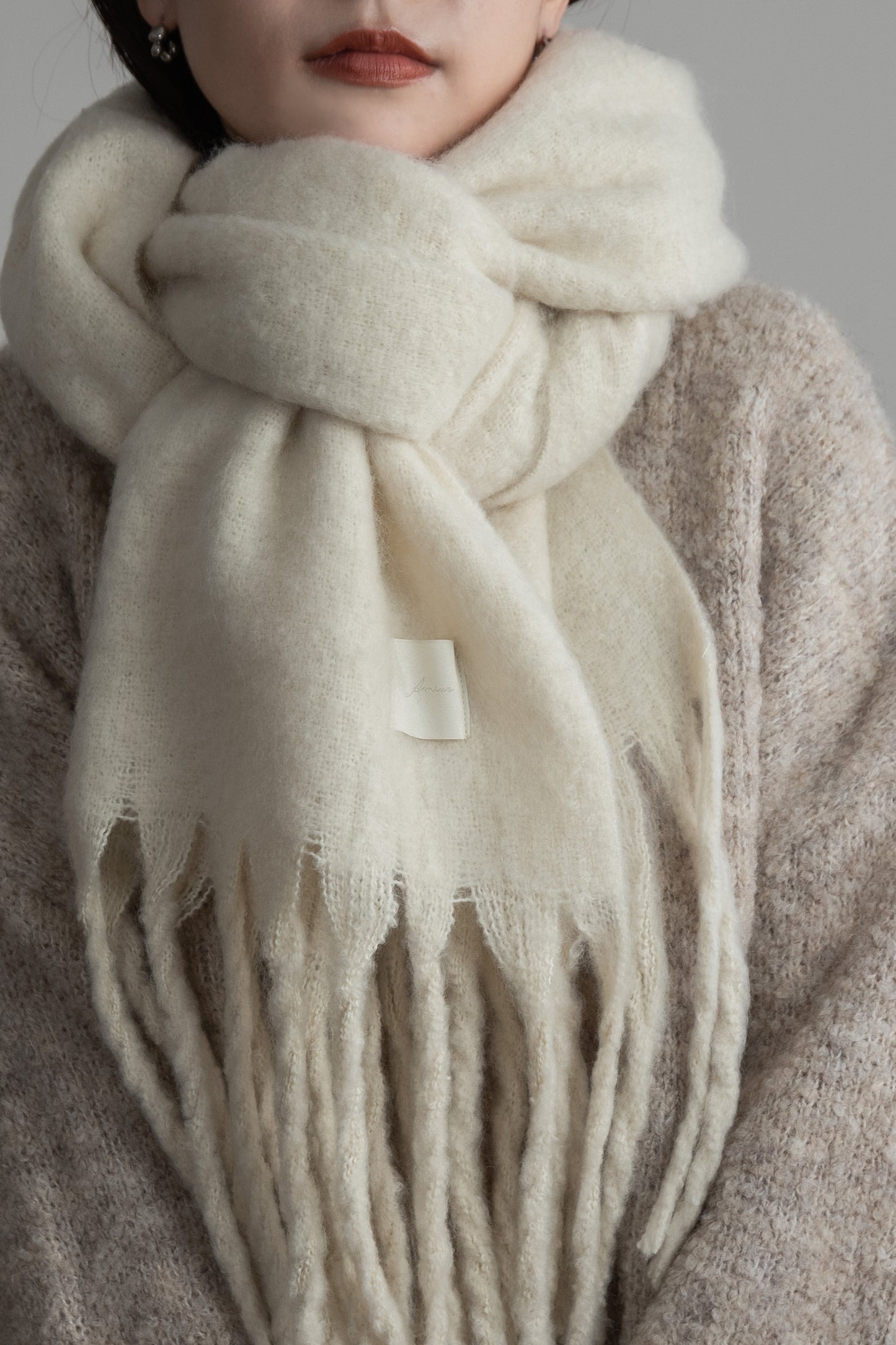 bulky volume fringe muffler