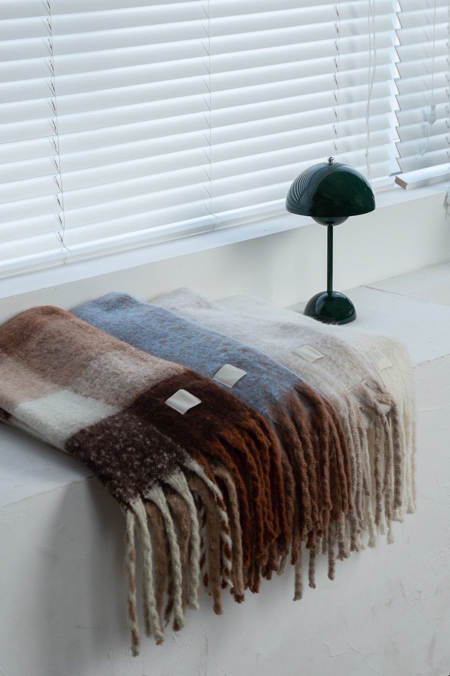 bulky volume fringe muffler