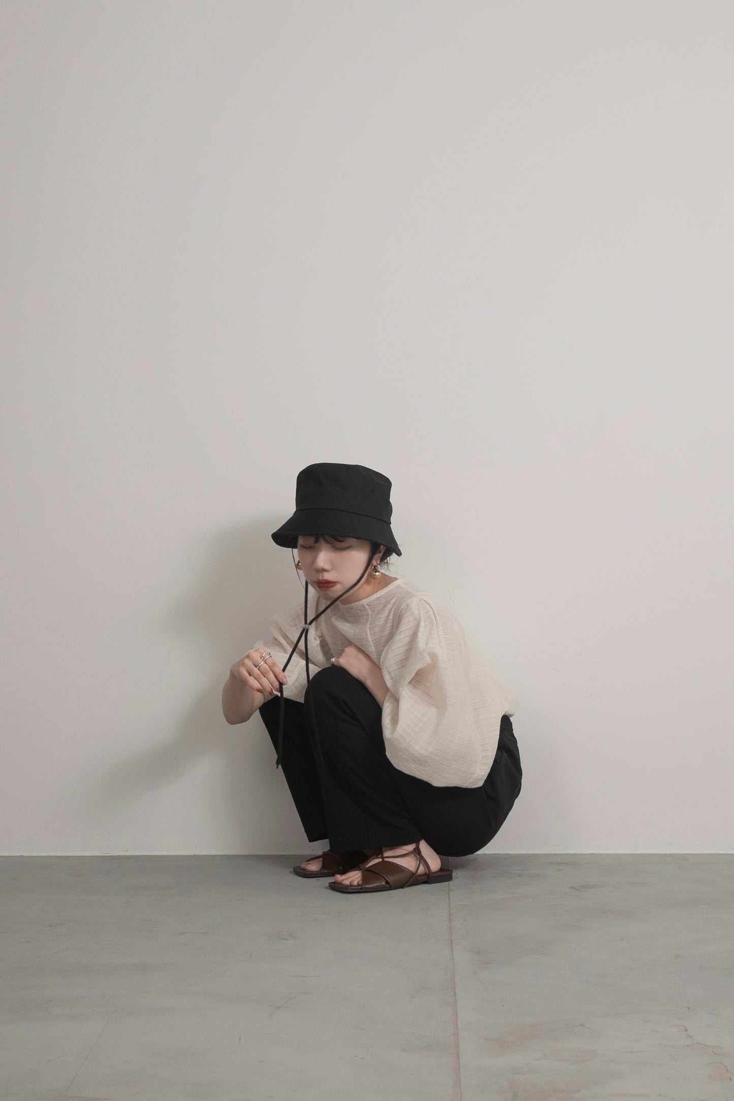 string bucket hat