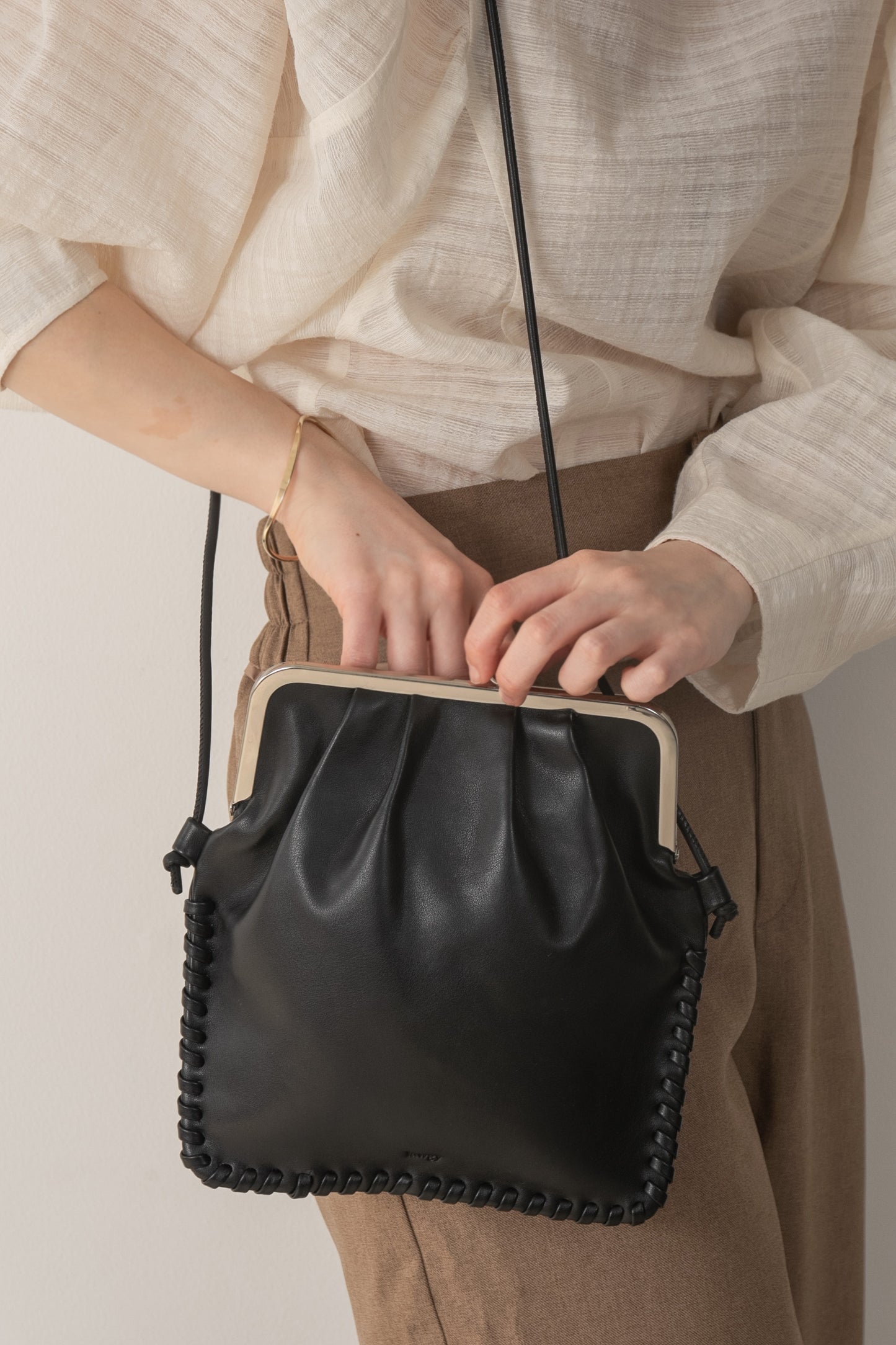 clasp wrap shoulder bag
