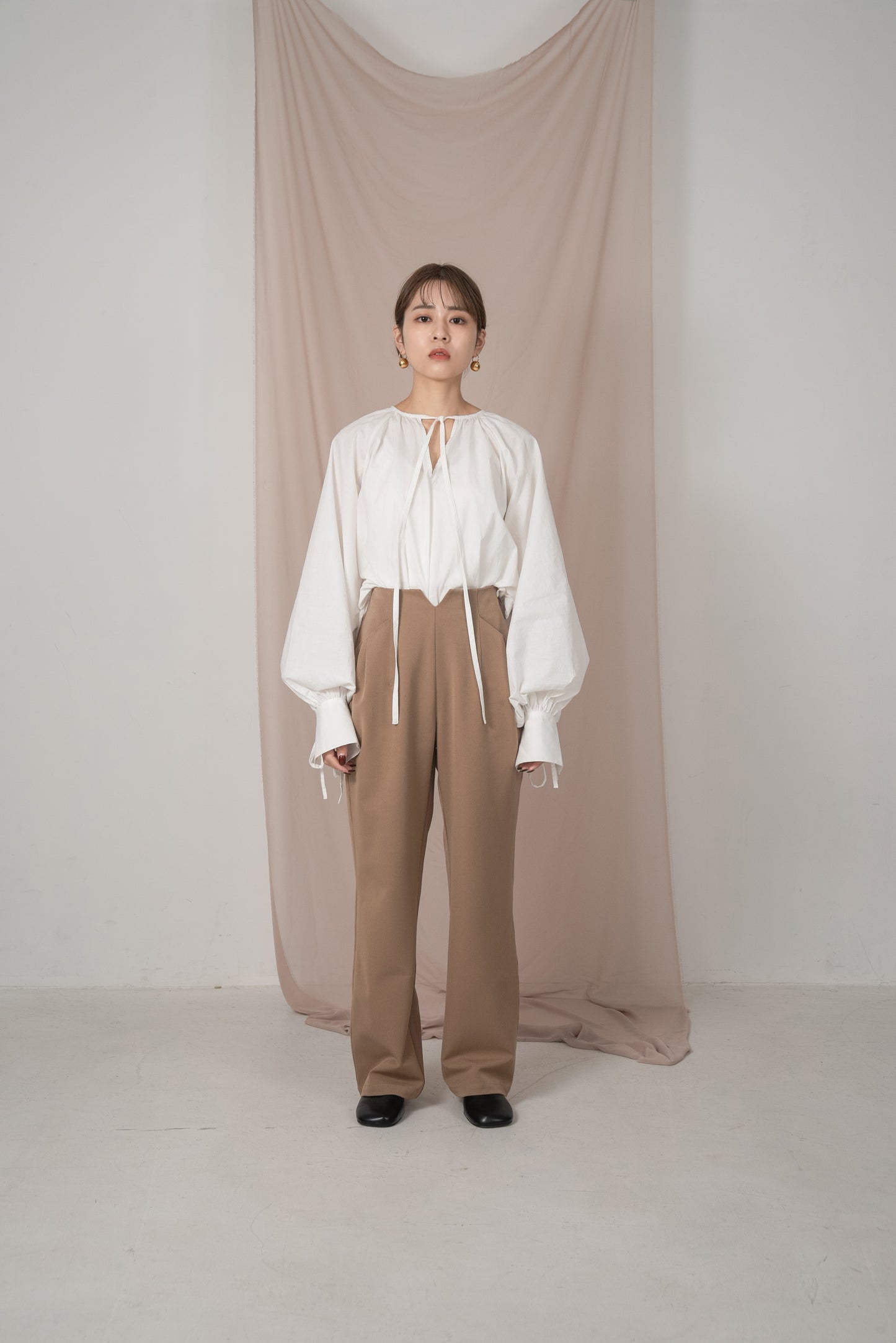pocket tuck tapered pants