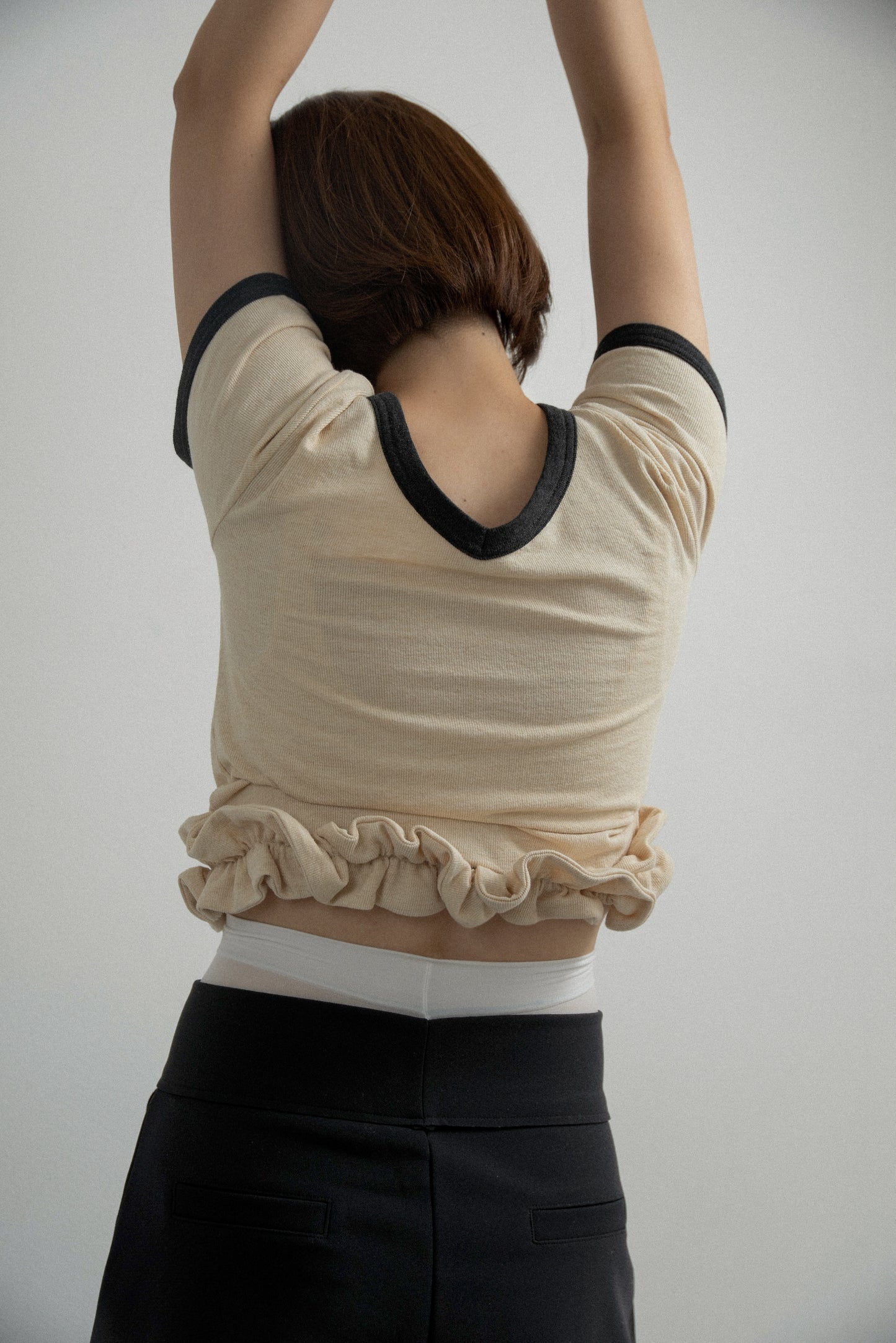 bicolor hem ruffle v tops