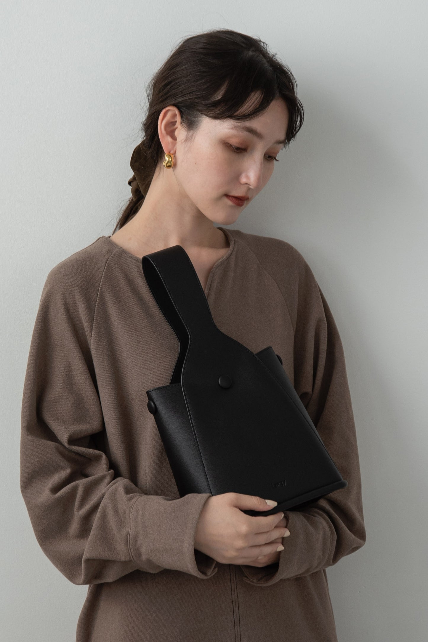 one handle button arrange bag