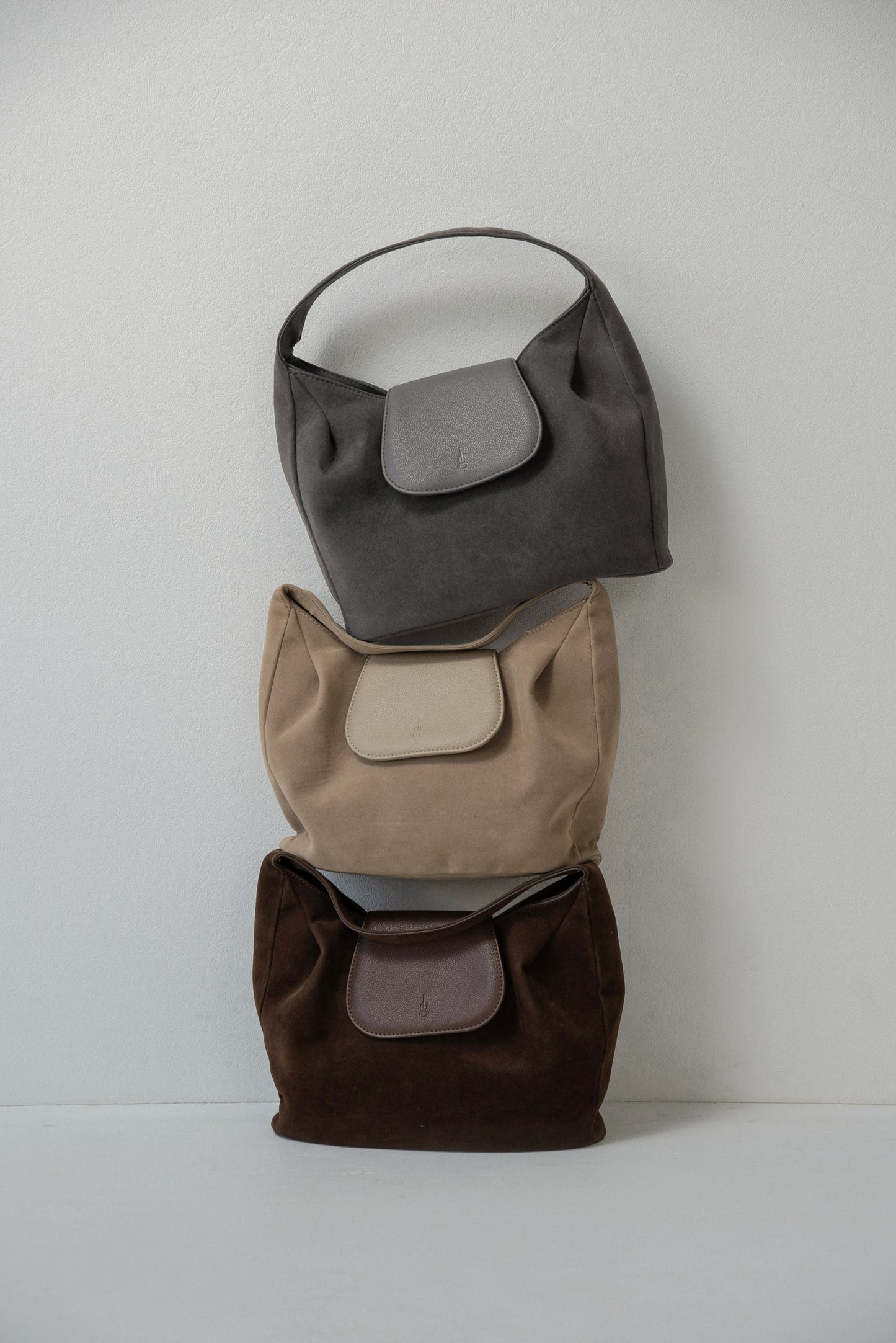 brushed material flap point bag