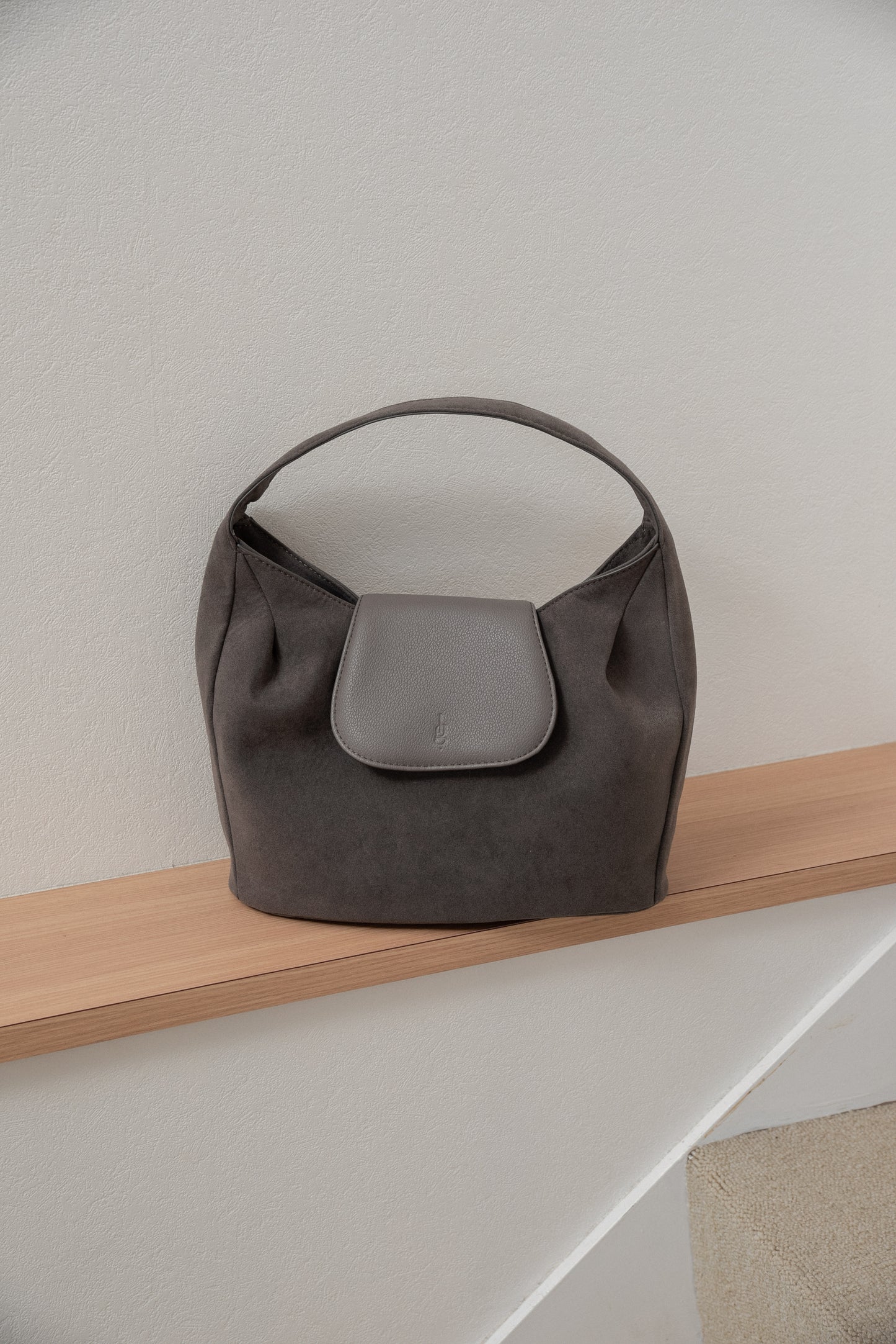 brushed material flap point bag