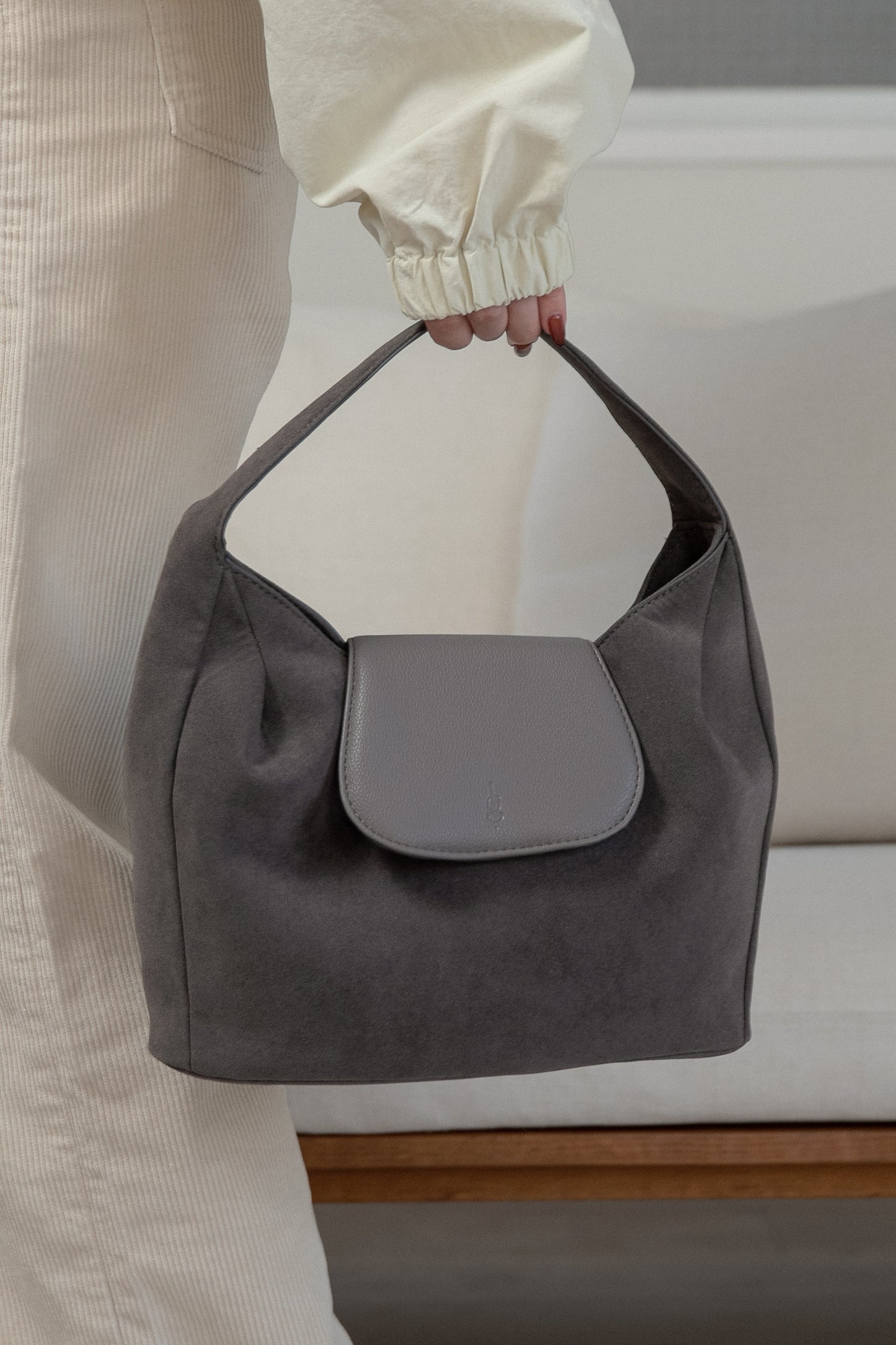 brushed material flap point bag