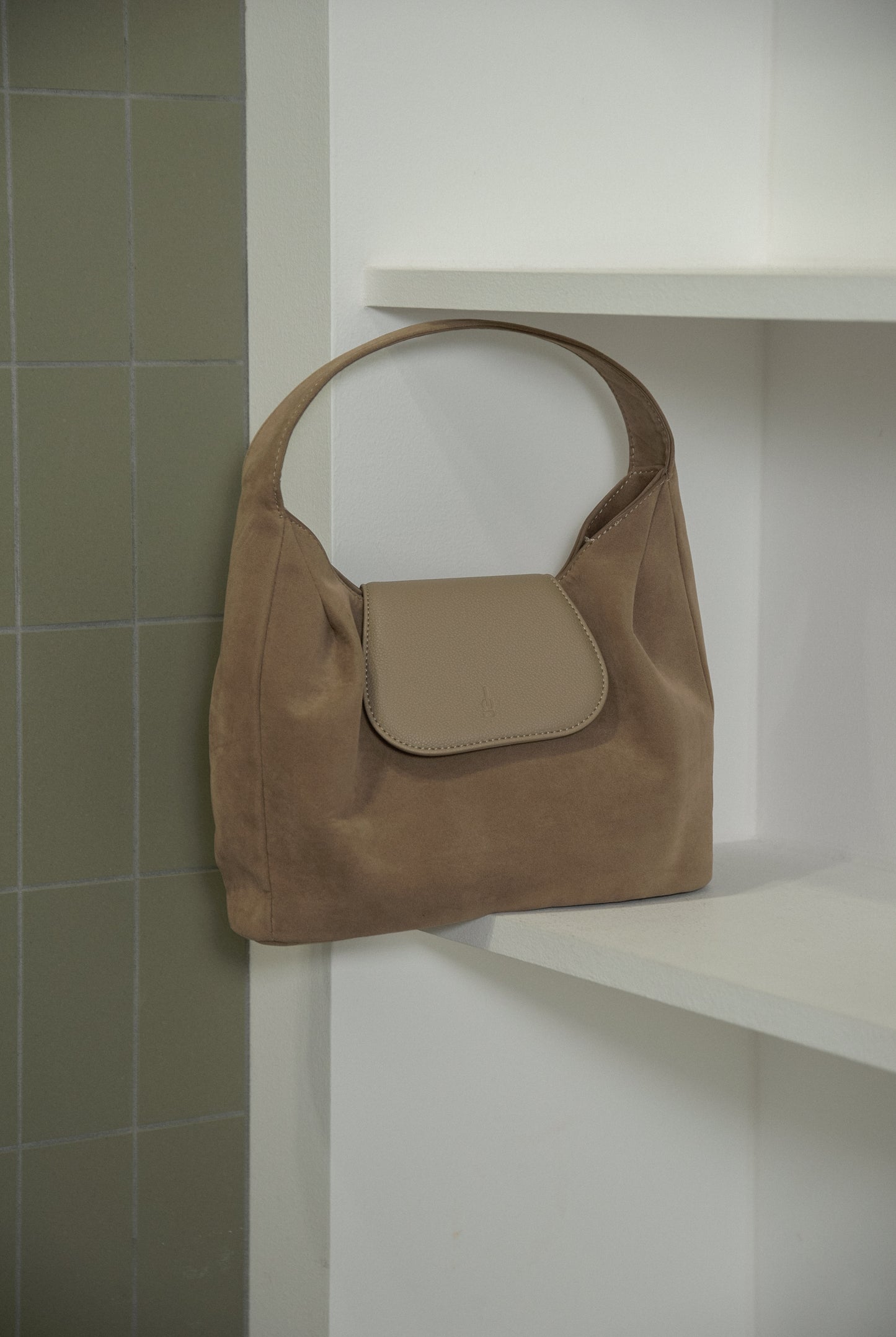 brushed material flap point bag