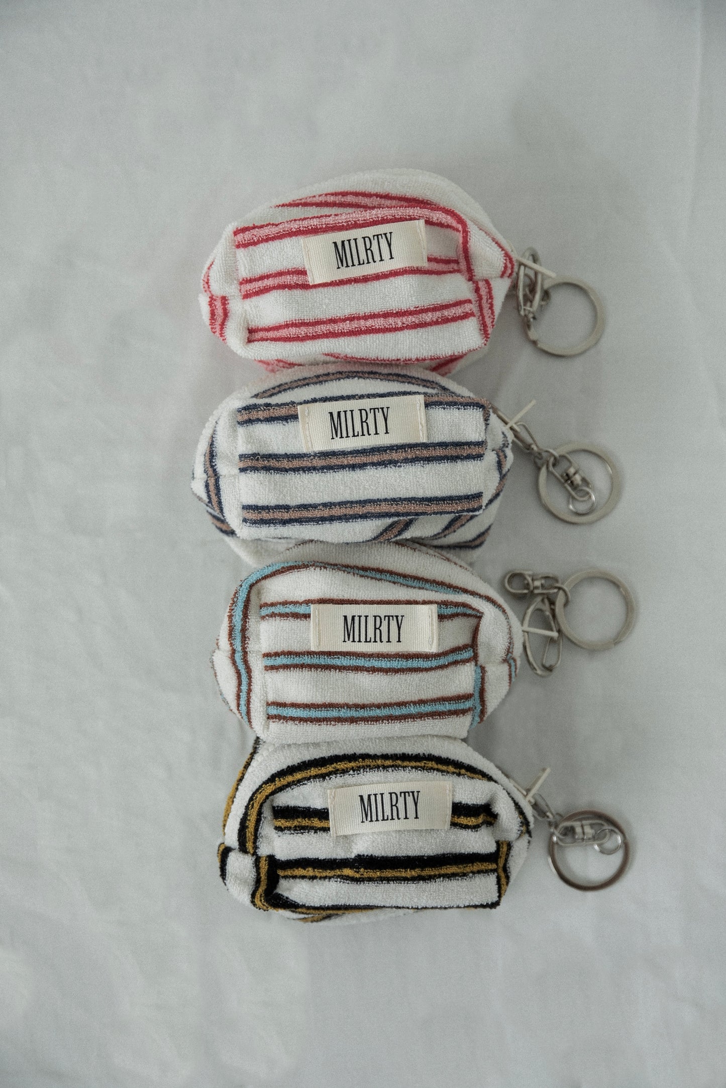 multi stripe terry mini pouch charm