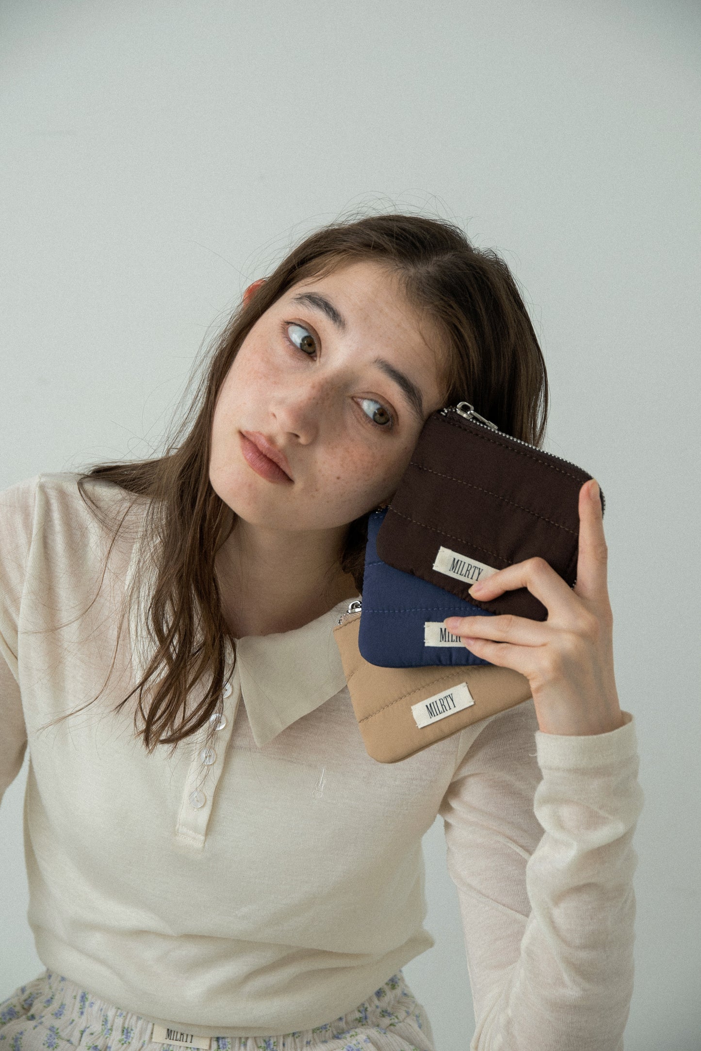 matte quilted mini zip wallet