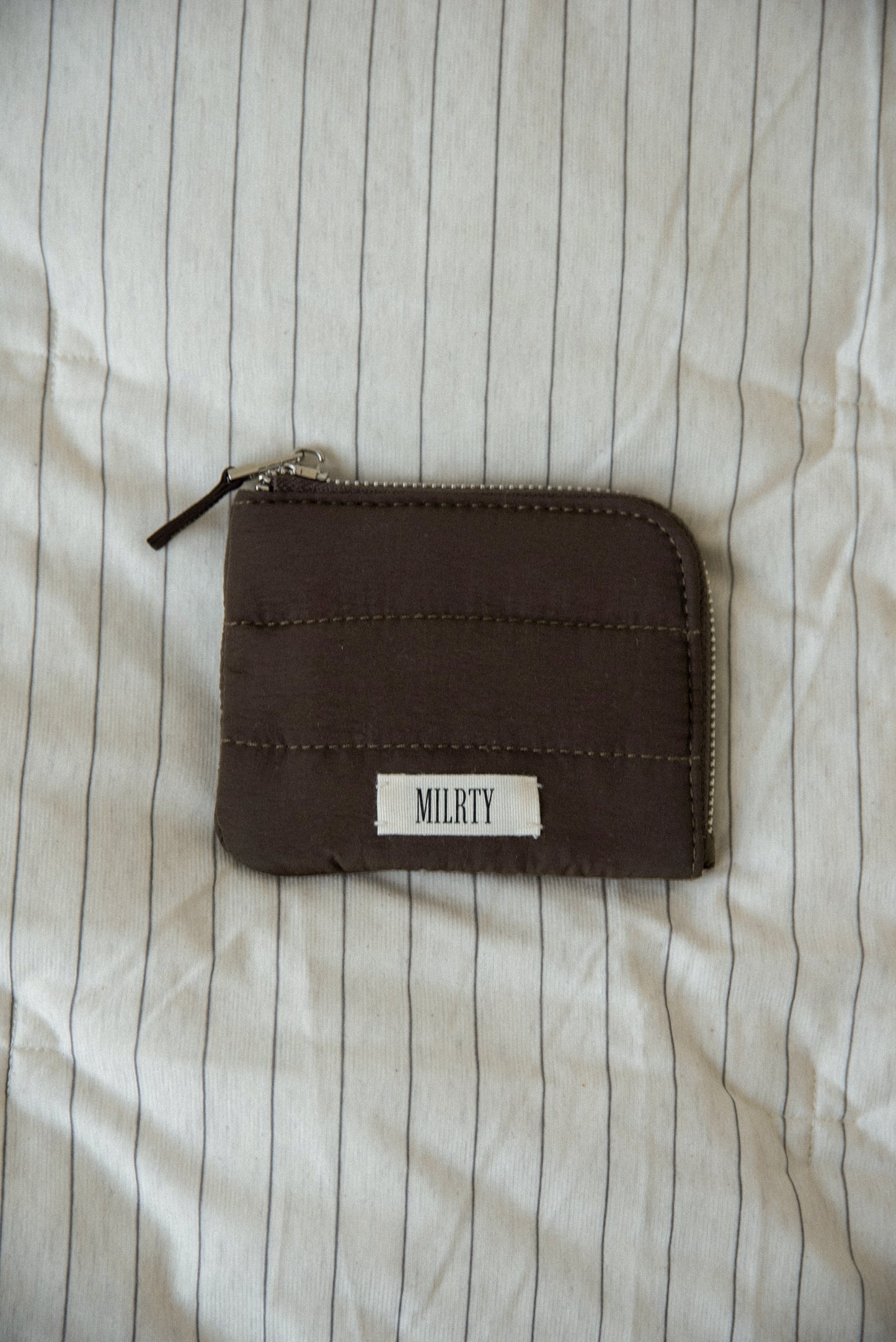matte quilted mini zip wallet