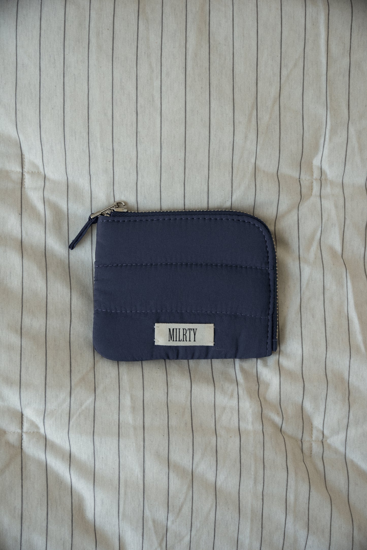 matte quilted mini zip wallet