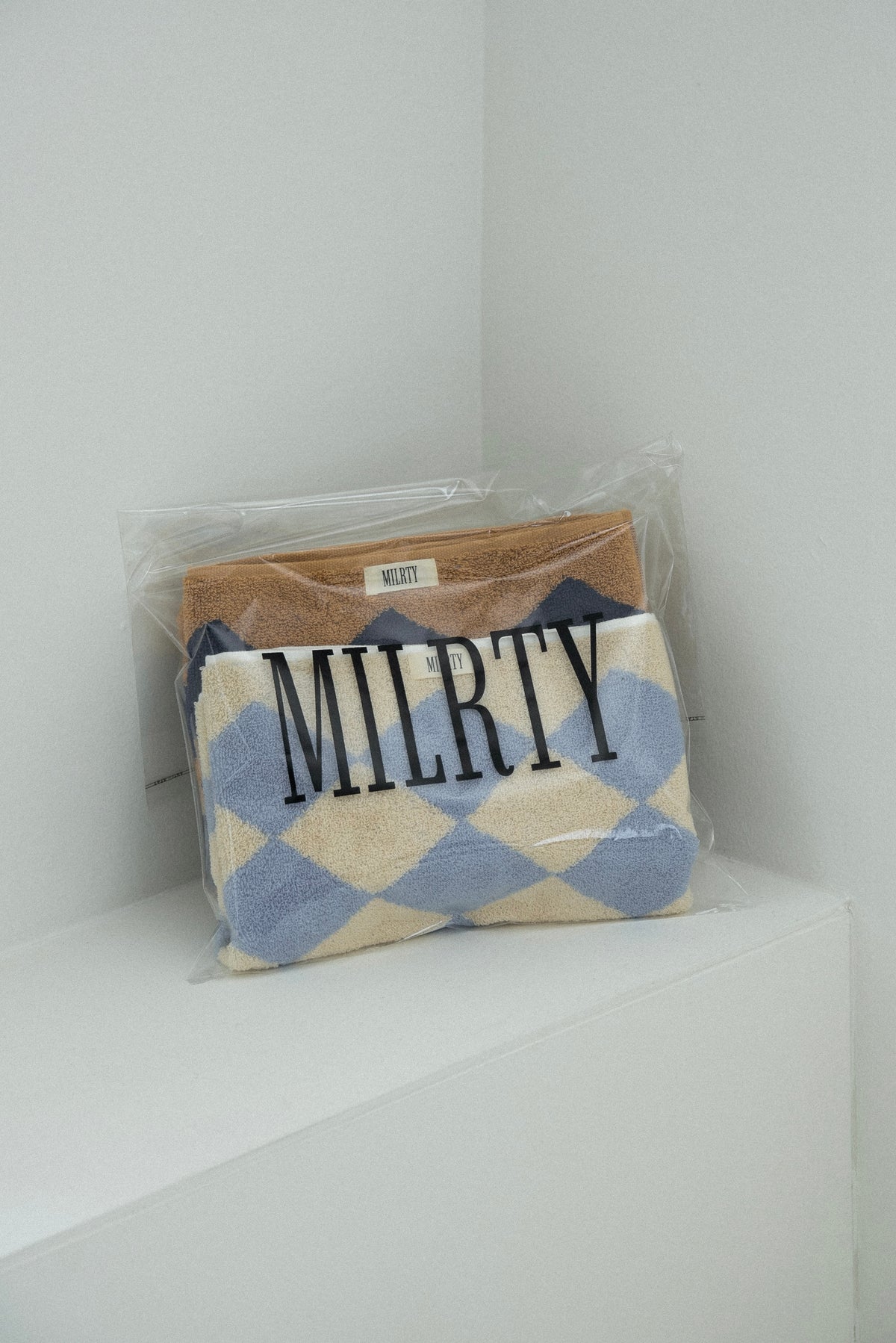 two tone argyle face towel