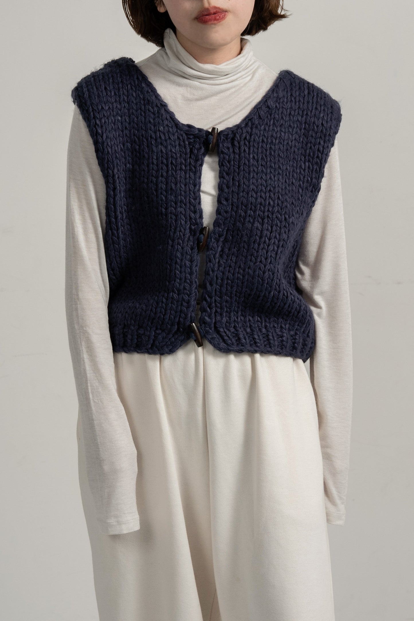 wood button chunky knit vest