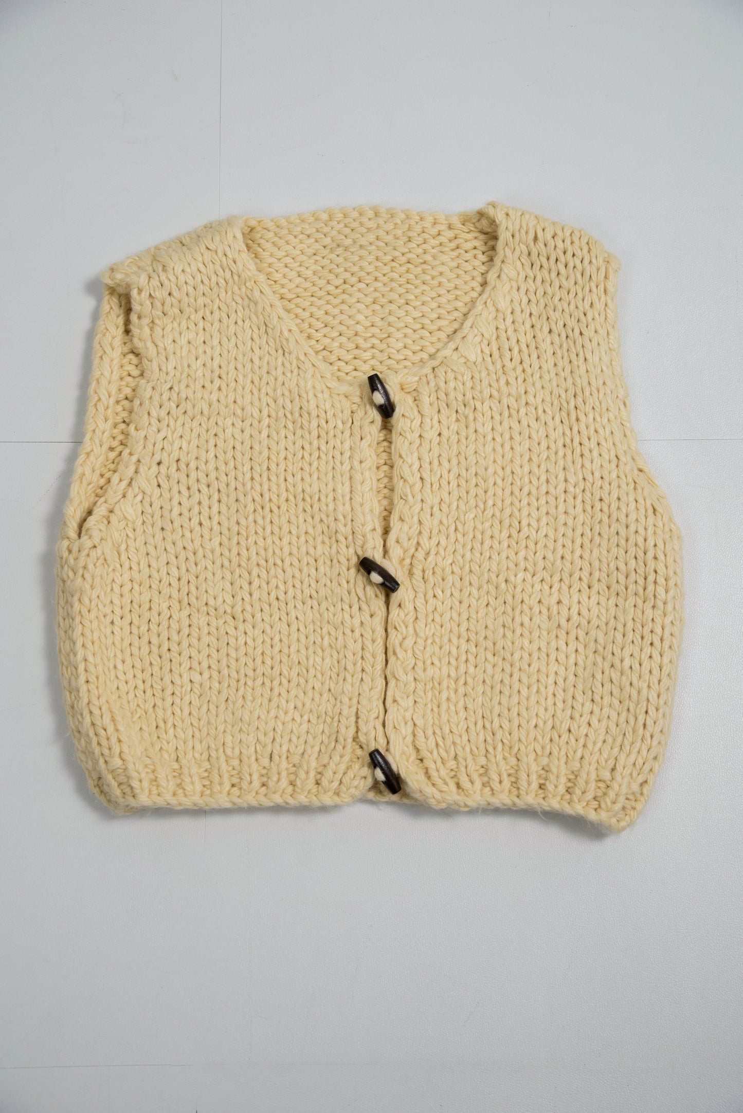 wood button chunky knit vest