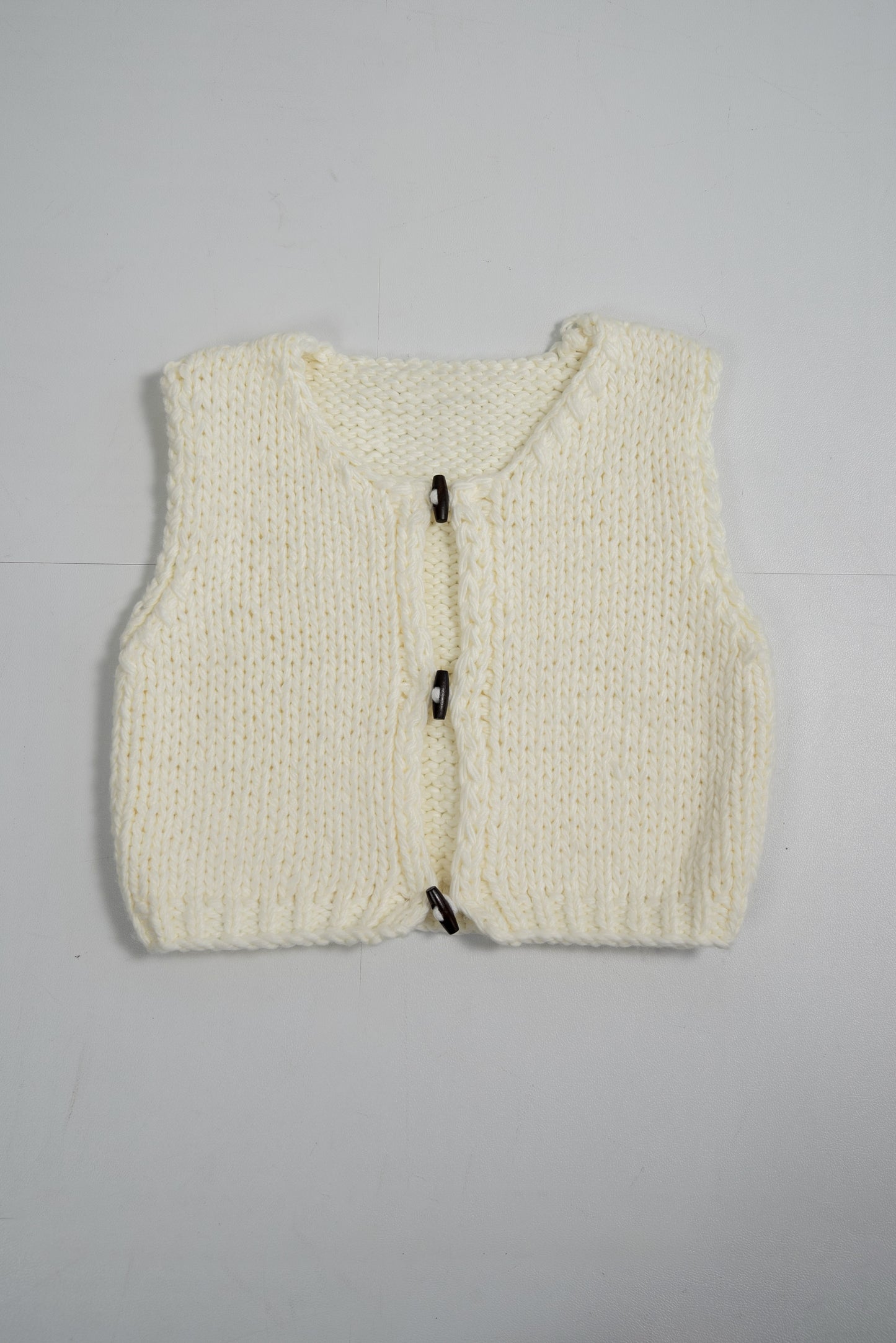 wood button chunky knit vest