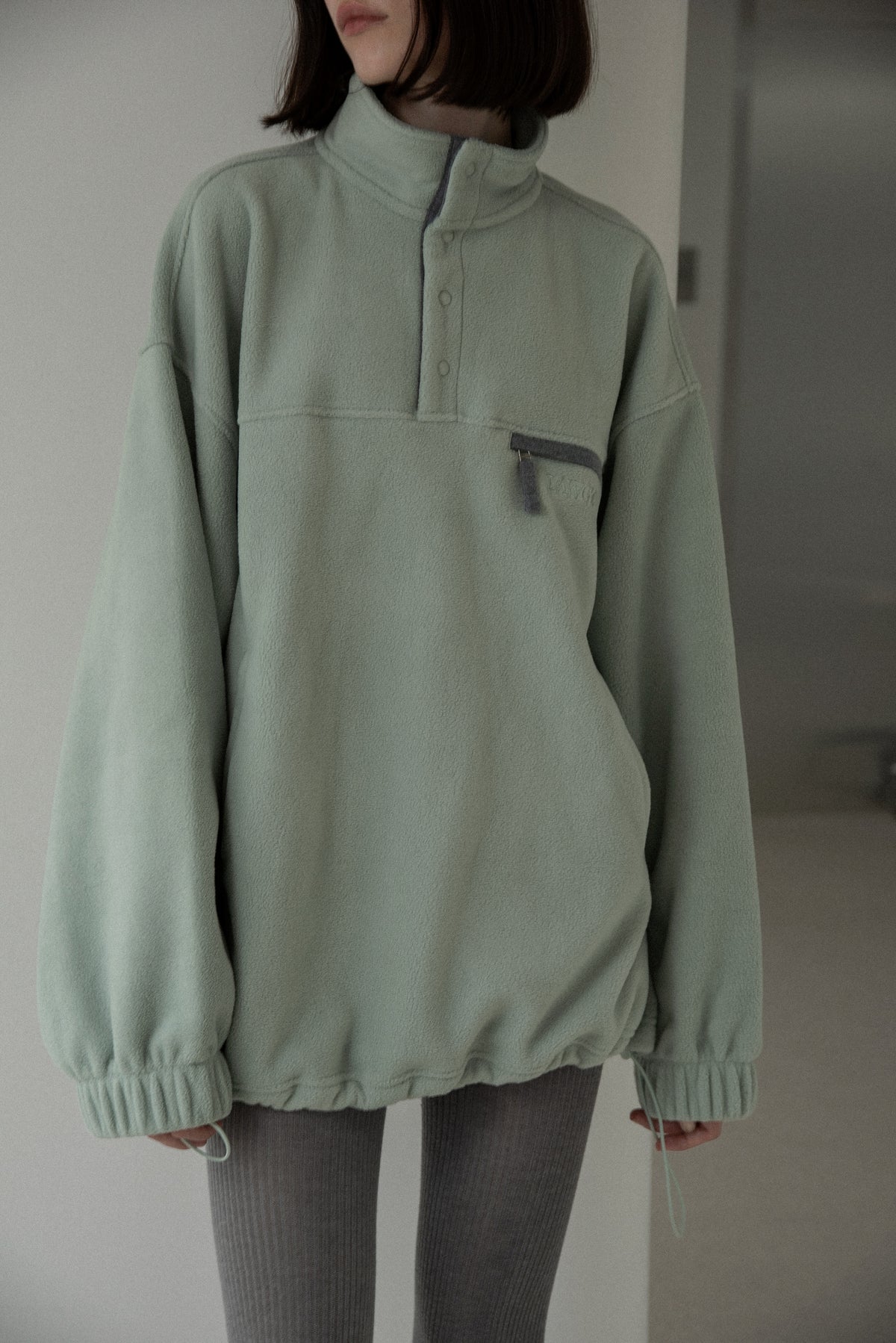 over size embroidery half button fleece