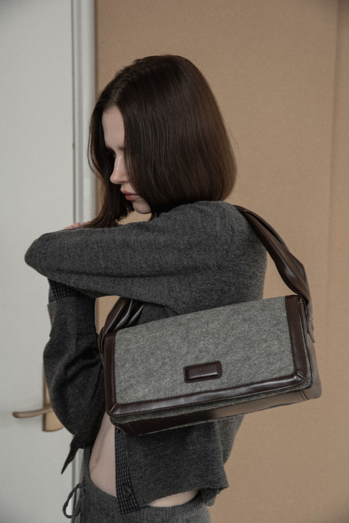 combination material shoulder twist bag