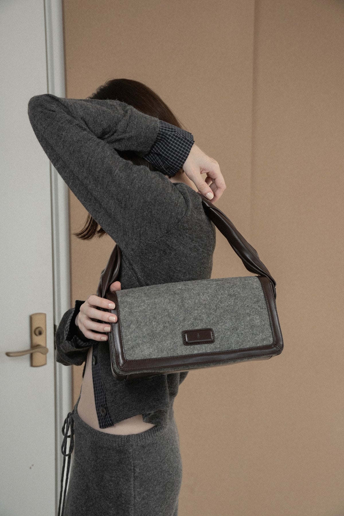 combination material shoulder twist bag