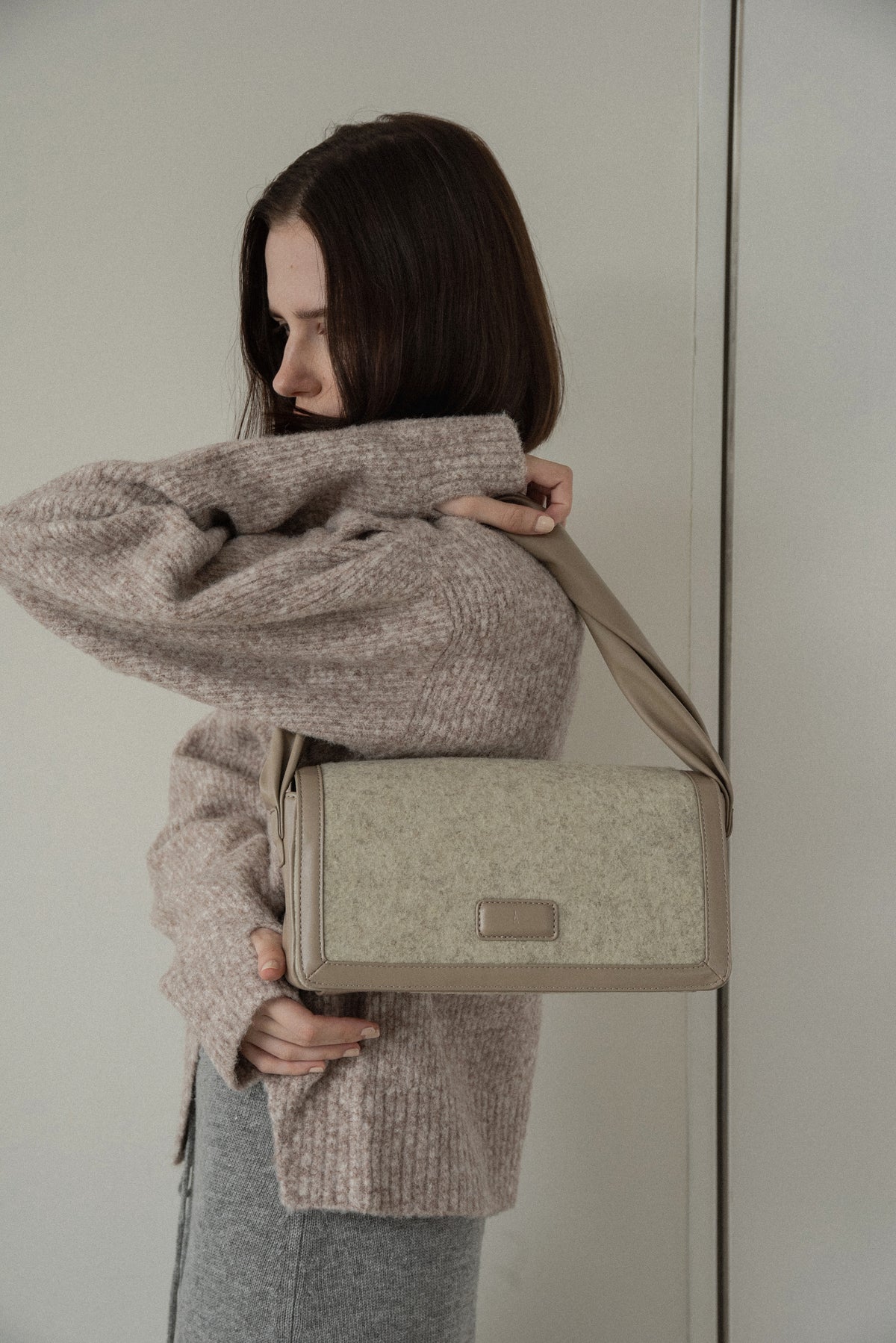 combination material shoulder twist bag